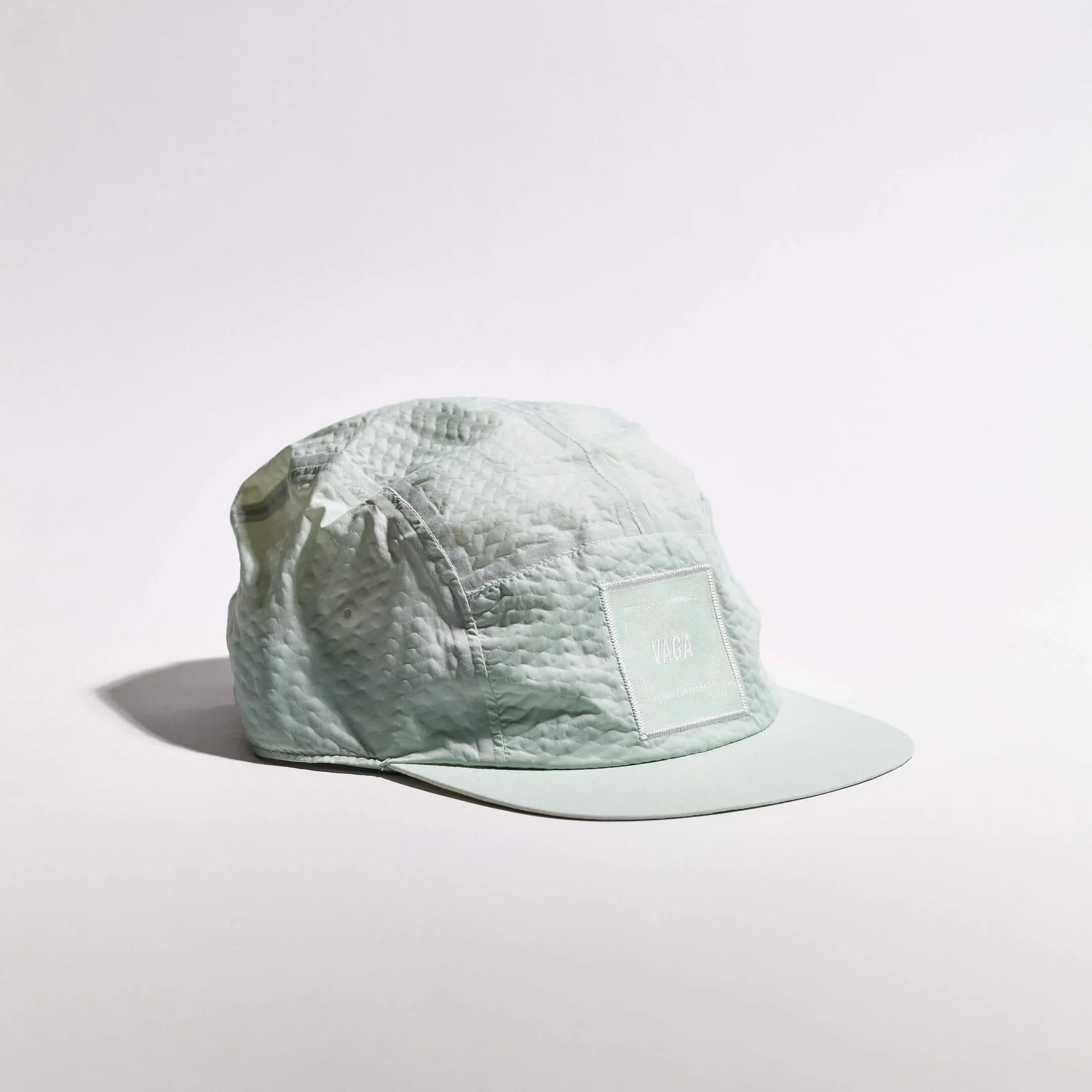 vaga-viper-lite-cap-textured-running-cap-mint-angle.jpg