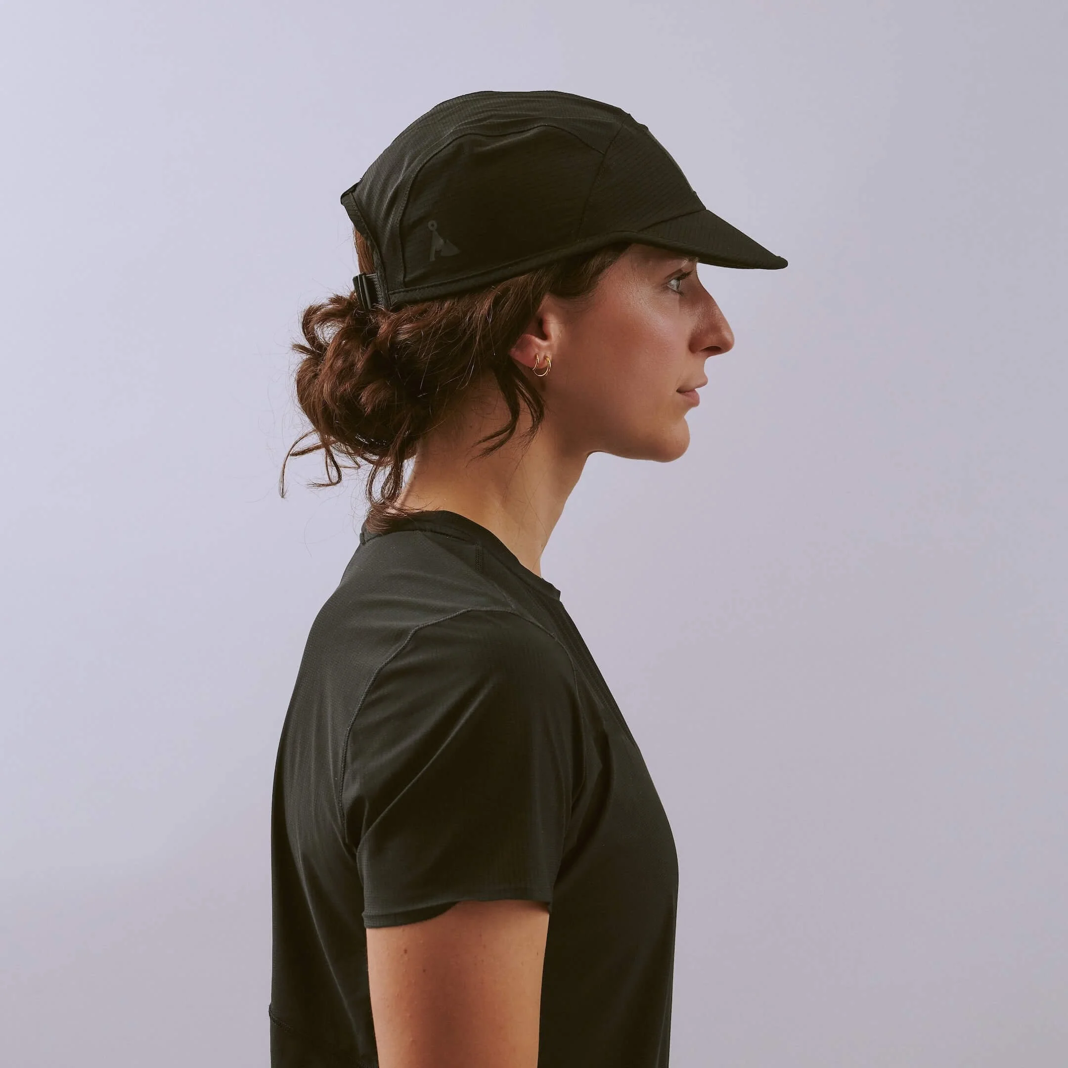 vaga-transit-lite-cap-unstructured-running-cap-black-l-model-profile.jpg
