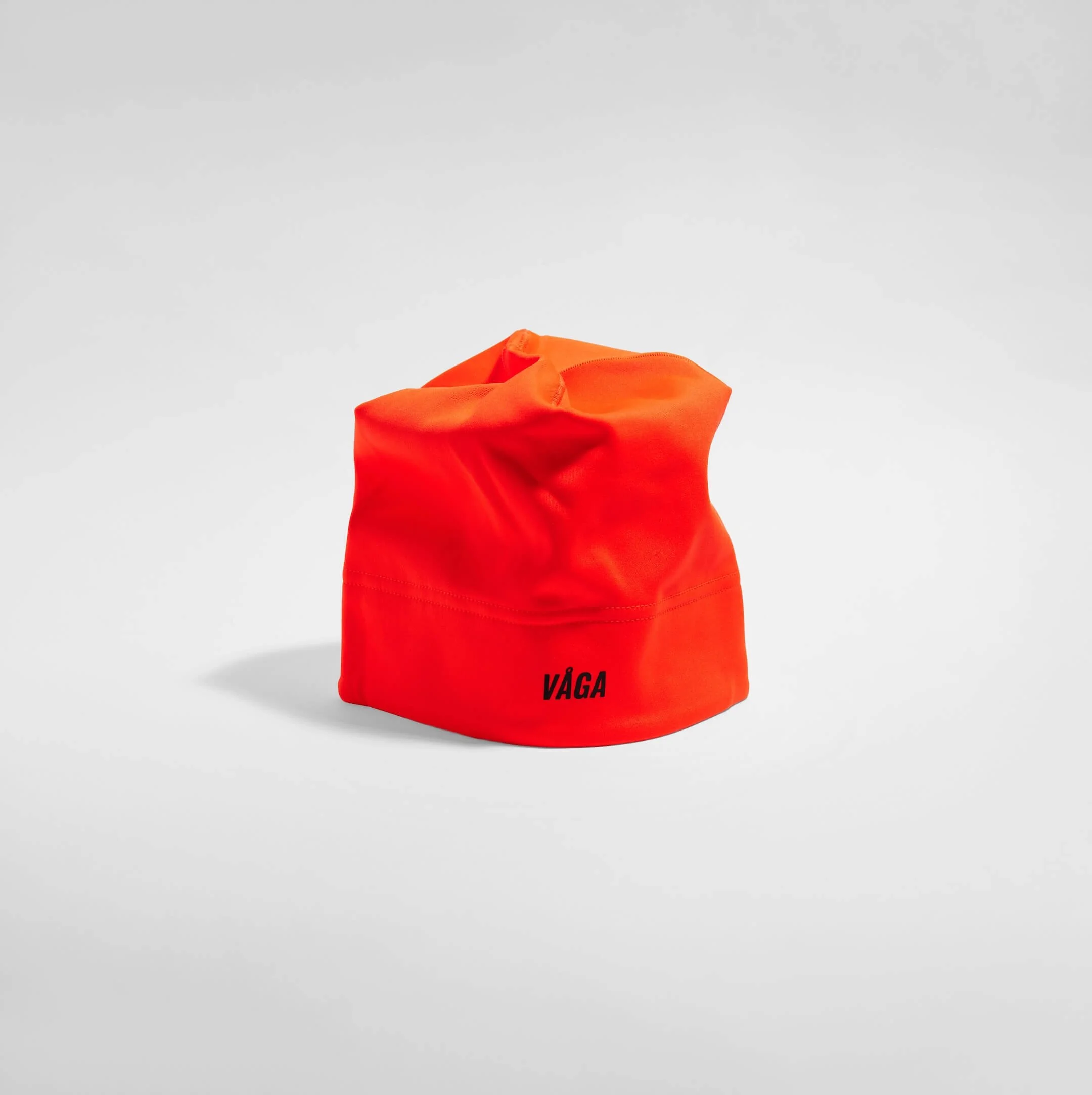 vaga-performance-skull-cap-running-hat-neon-orange-stood.jpg