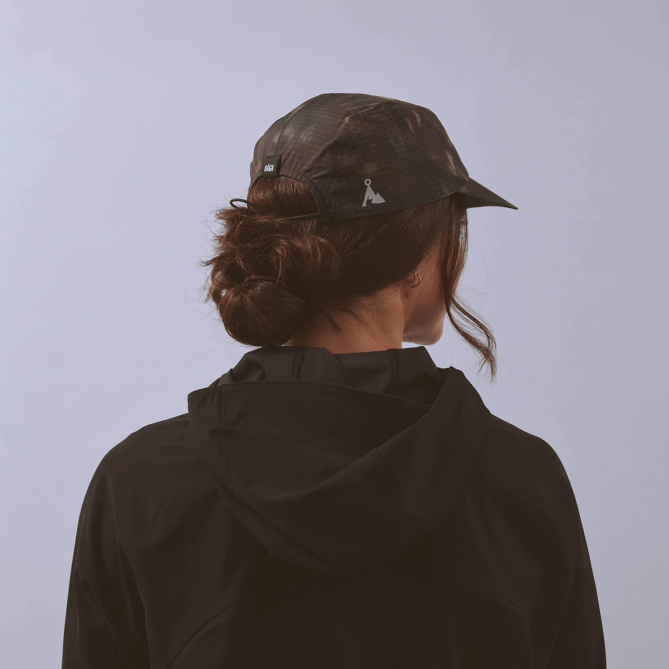 vaga-night-club-running-cap-ember-model-back-angle.jpg