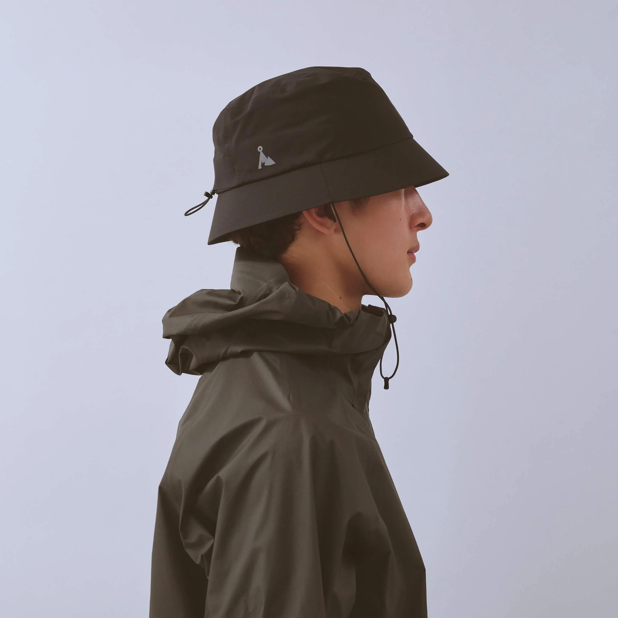 vaga-waterproof-bucket-hat-black-model-profile.jpg
