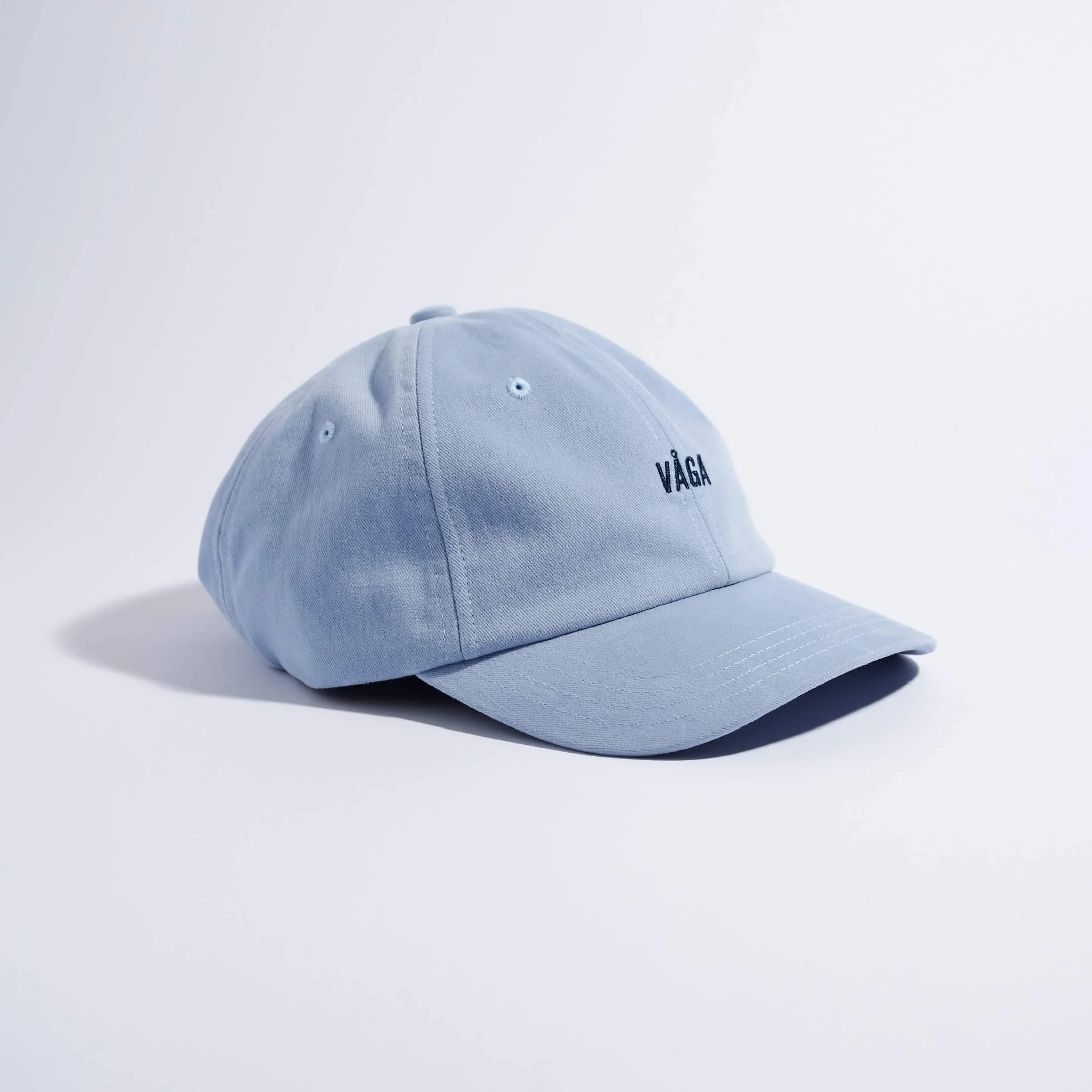 vaga-washed-cotton-cap-postalblue-angle.jpg