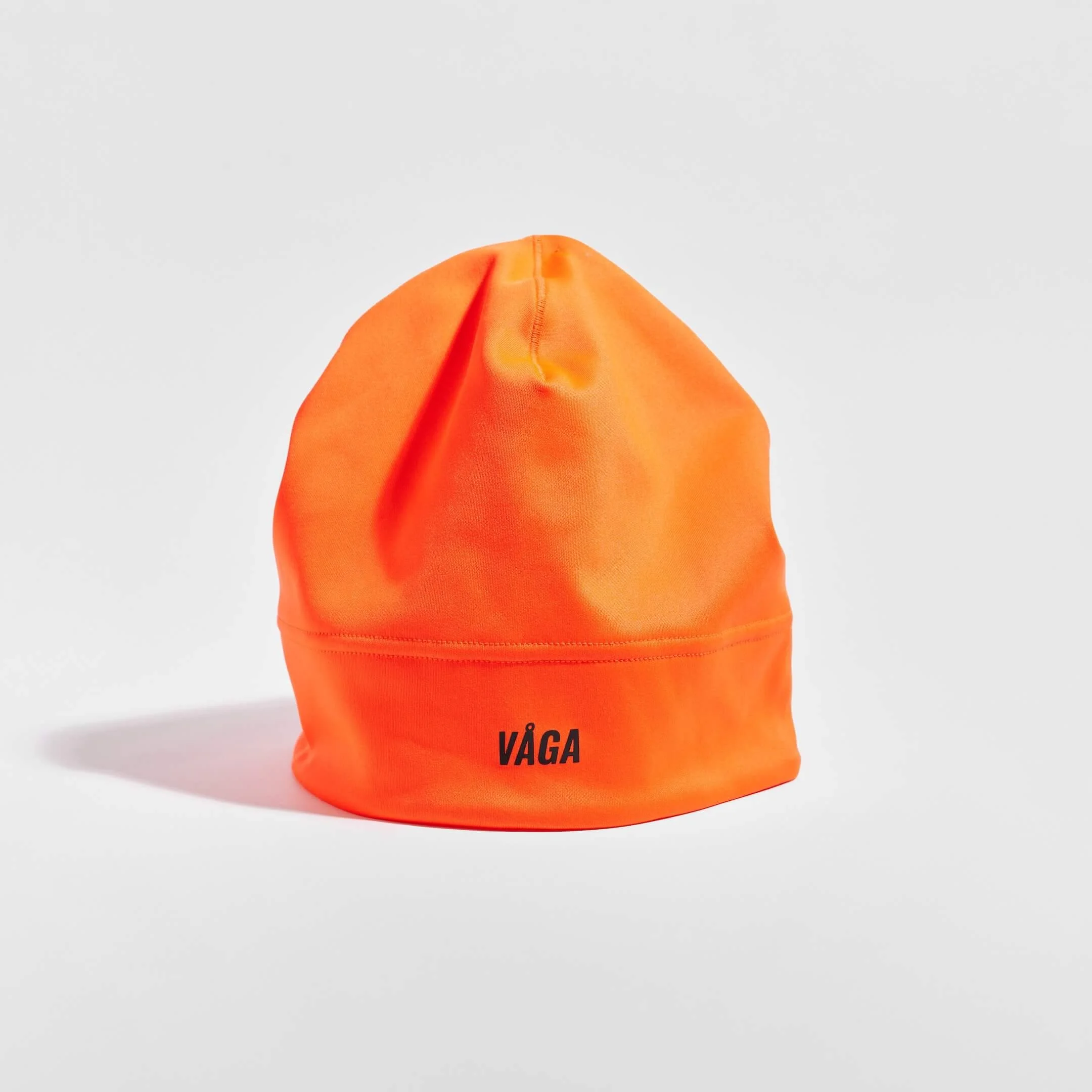 vaga-performance-skull-cap-running-hat-neonorange-stood.jpg