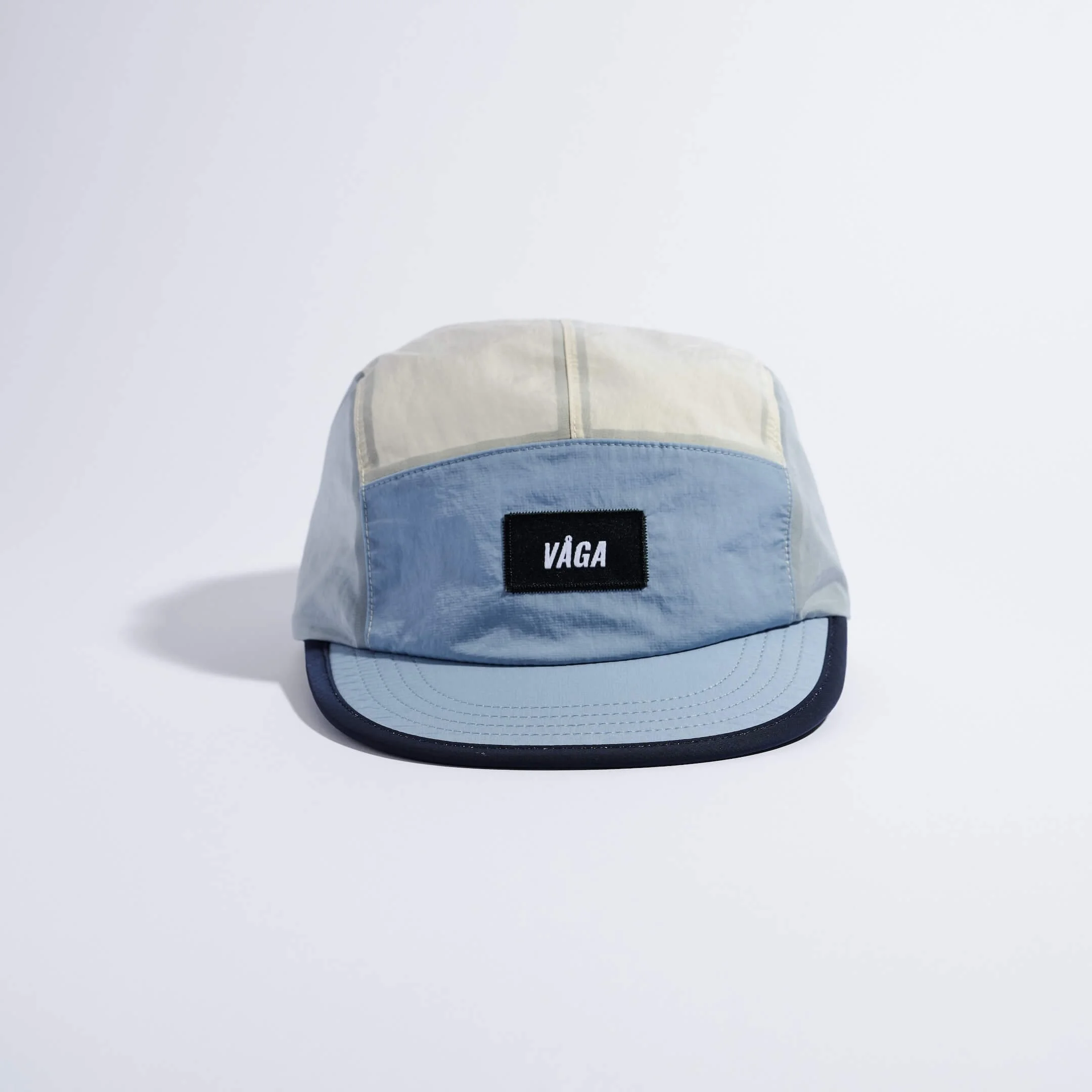 vaga-pacer-cap-running-cap-postalblue-dustgrey-navy-front.jpg