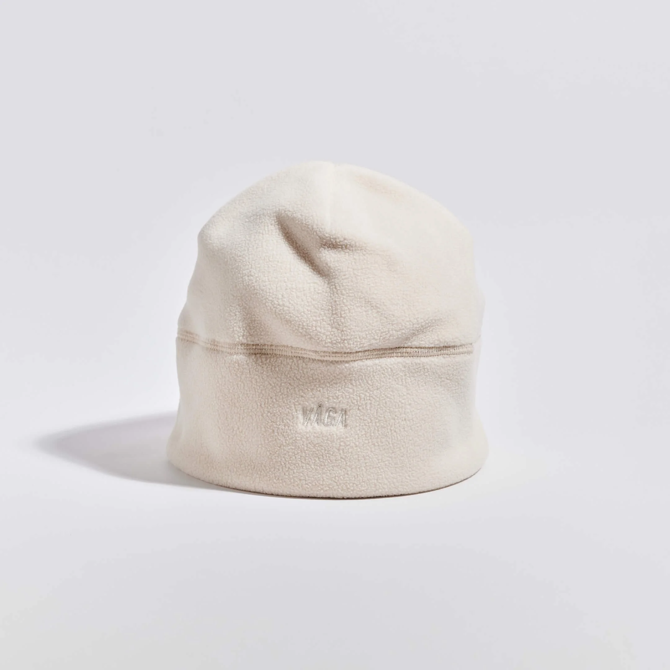 vaga-fleece-beanie-running-hat-ecru-stood.jpg