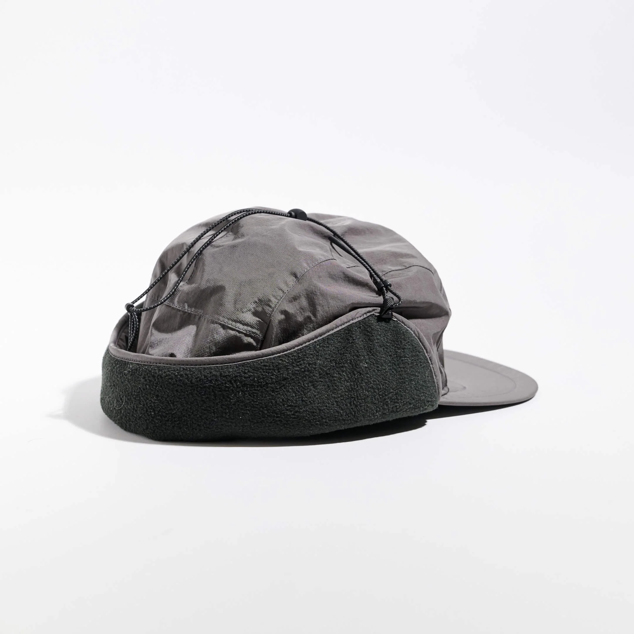 vaga-padded-hiker-cap-midgrey-back-angle-fastened.jpg