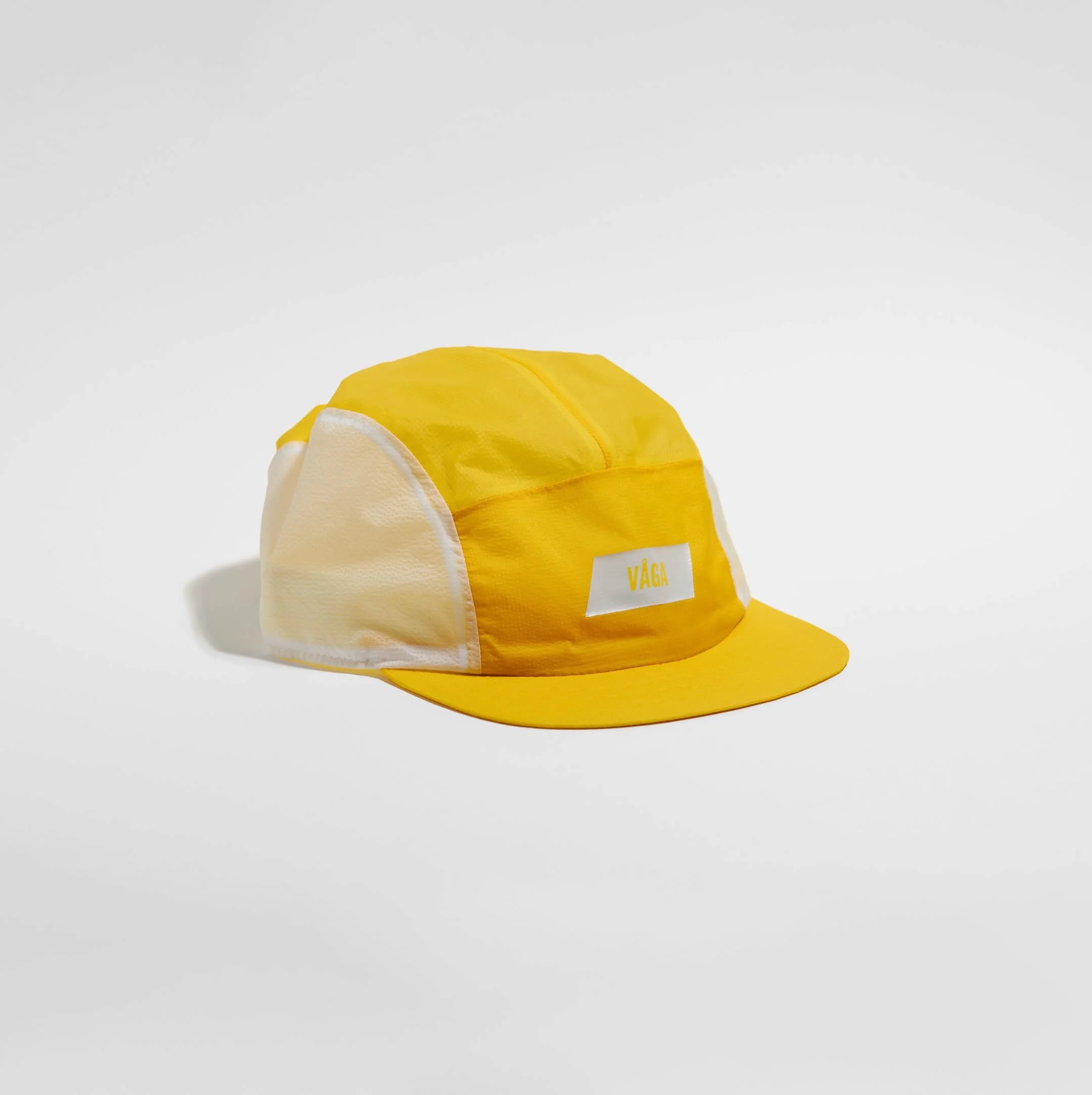 vaga-feather-light-cap-running-cap-yellow-angle.jpg