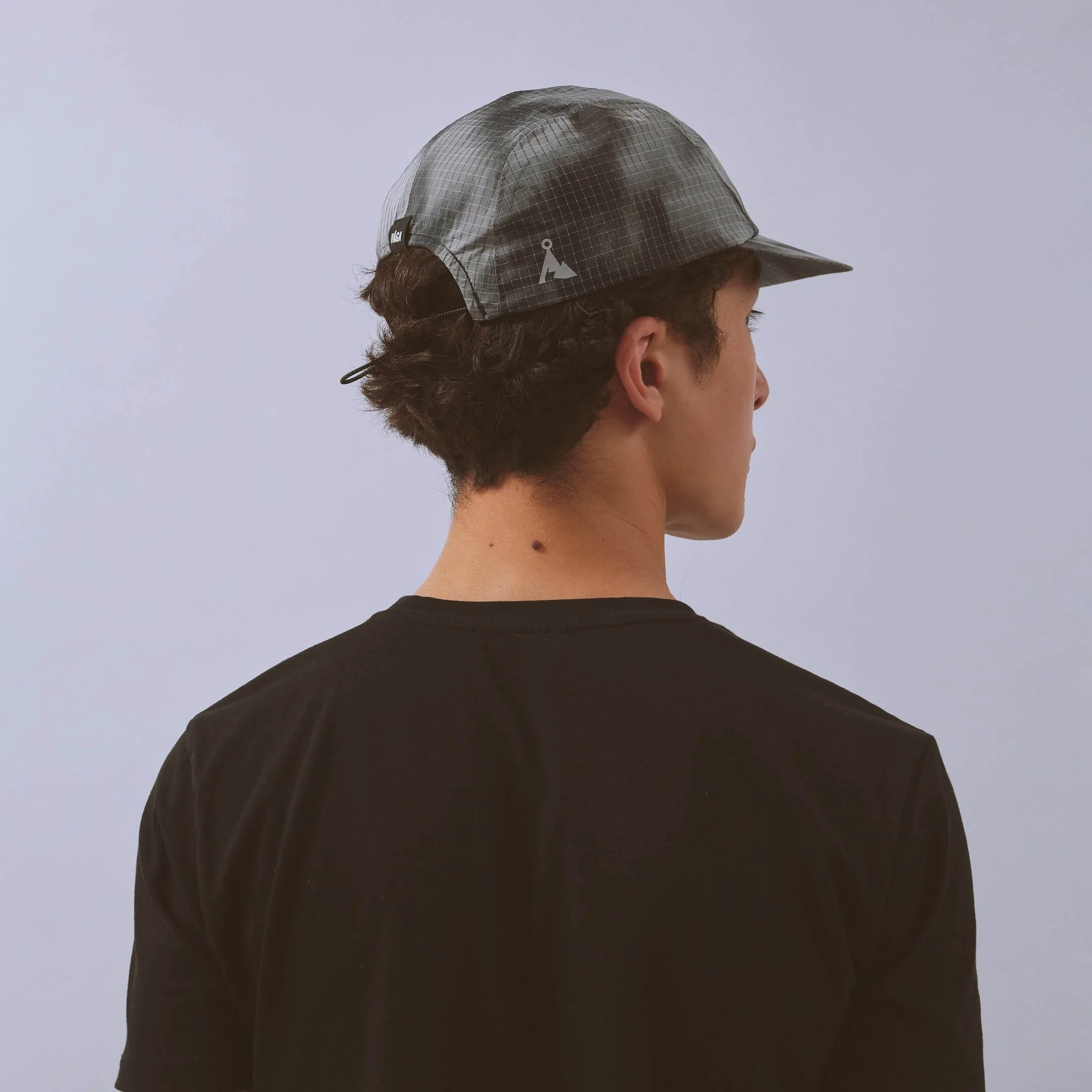 vaga-night-club-running-cap-black-grey-model-back-angle.jpg