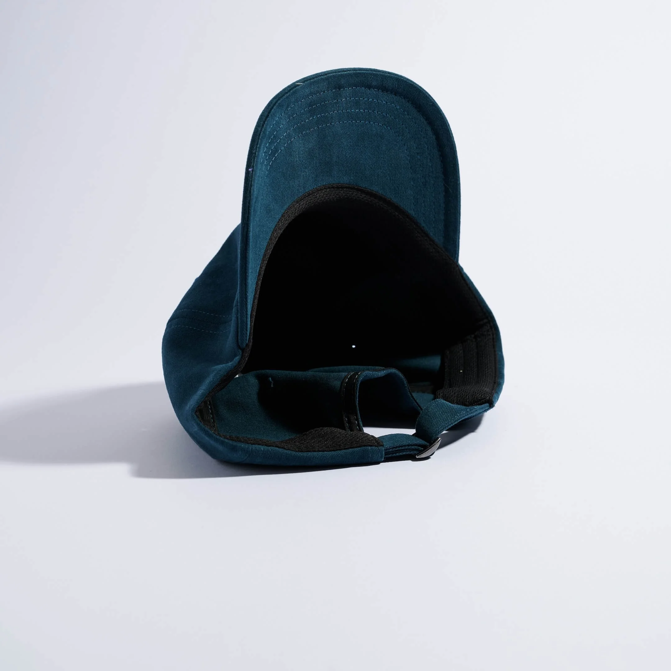 vaga-washed-cotton-cap-darkteal-underneath.jpg