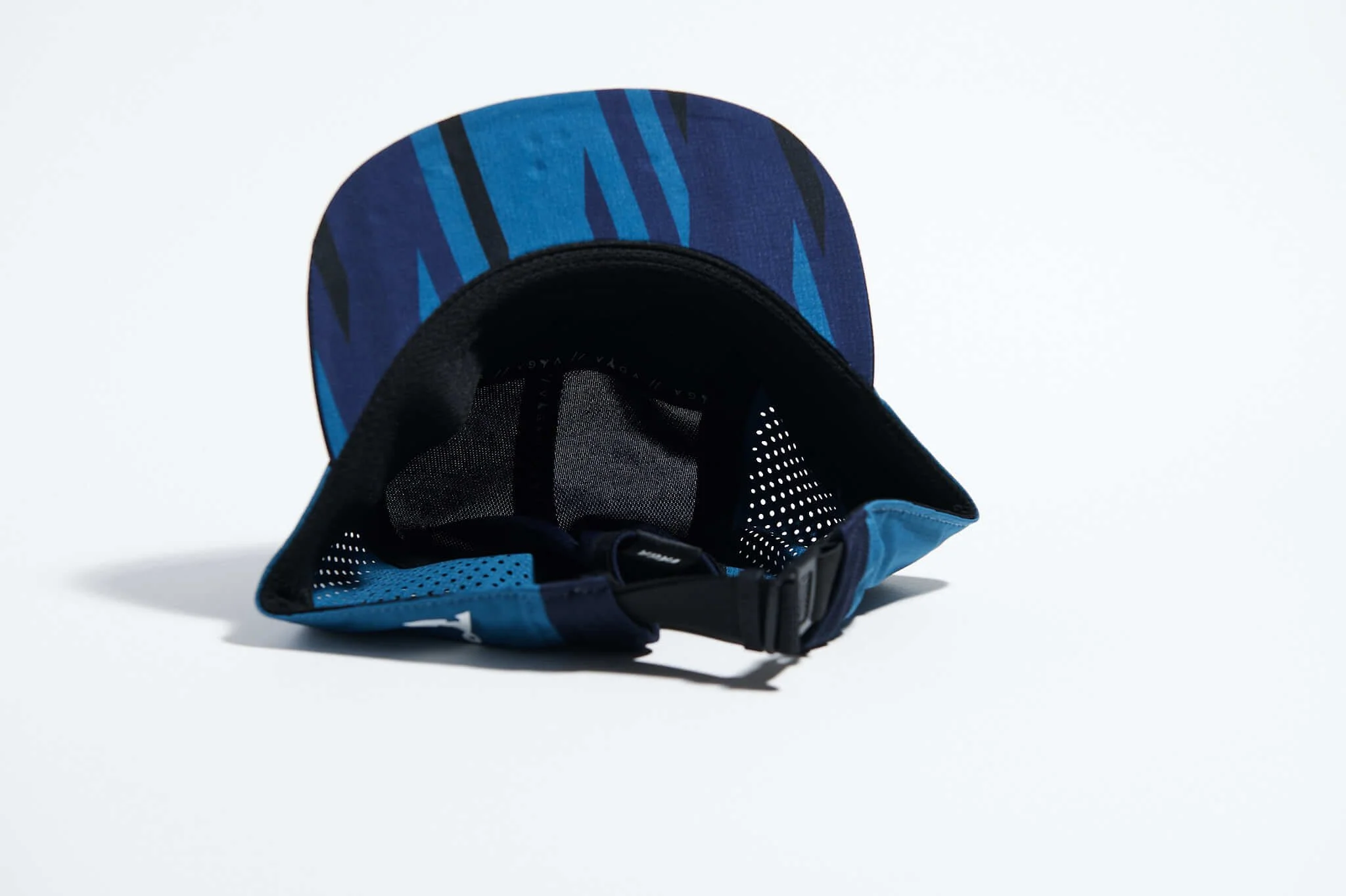 våga-feather-racing-cap-teal-navy-blue-underneath.jpg