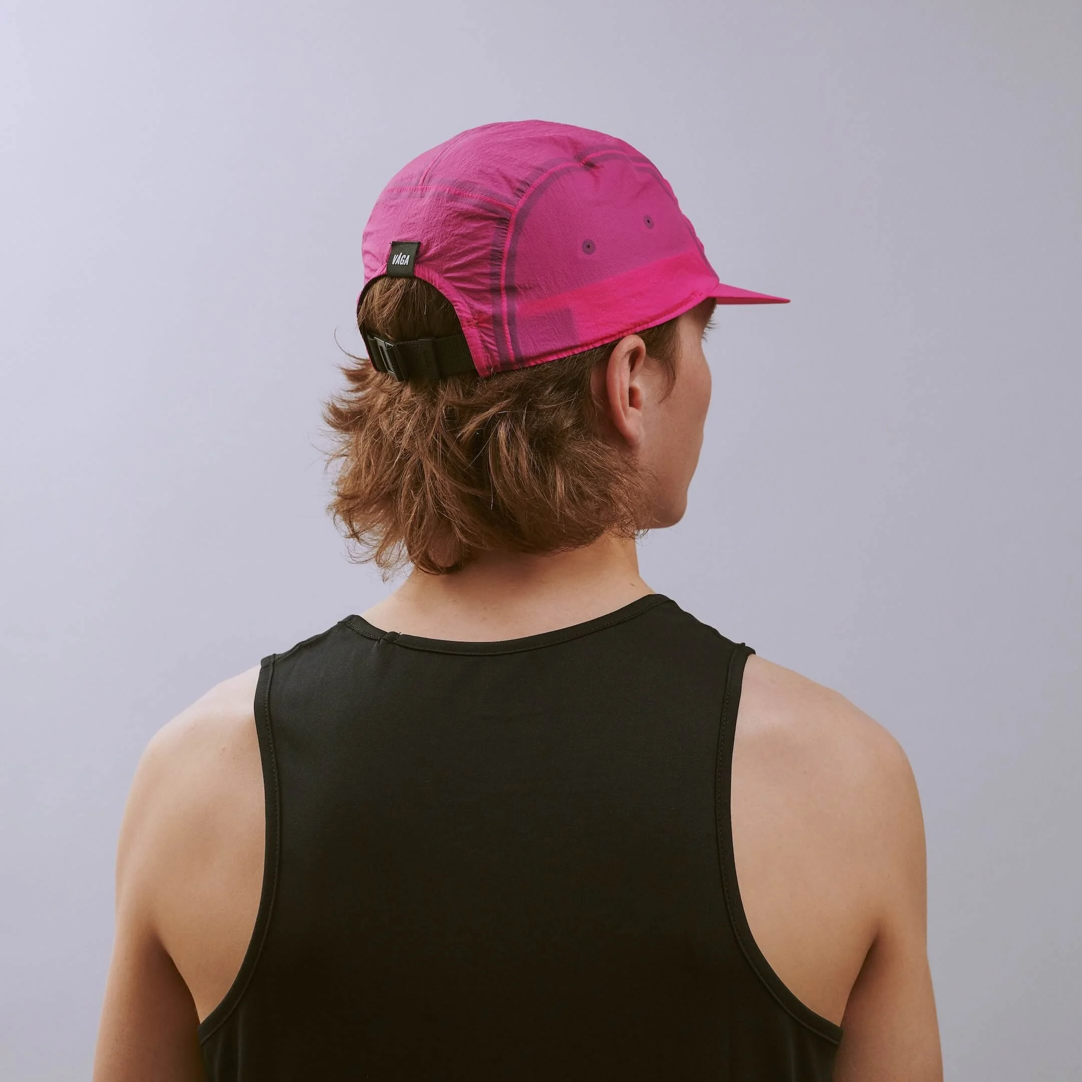 vaga-feather-edge-cap-racing-cap-brightpink-e-model-angle.jpg
