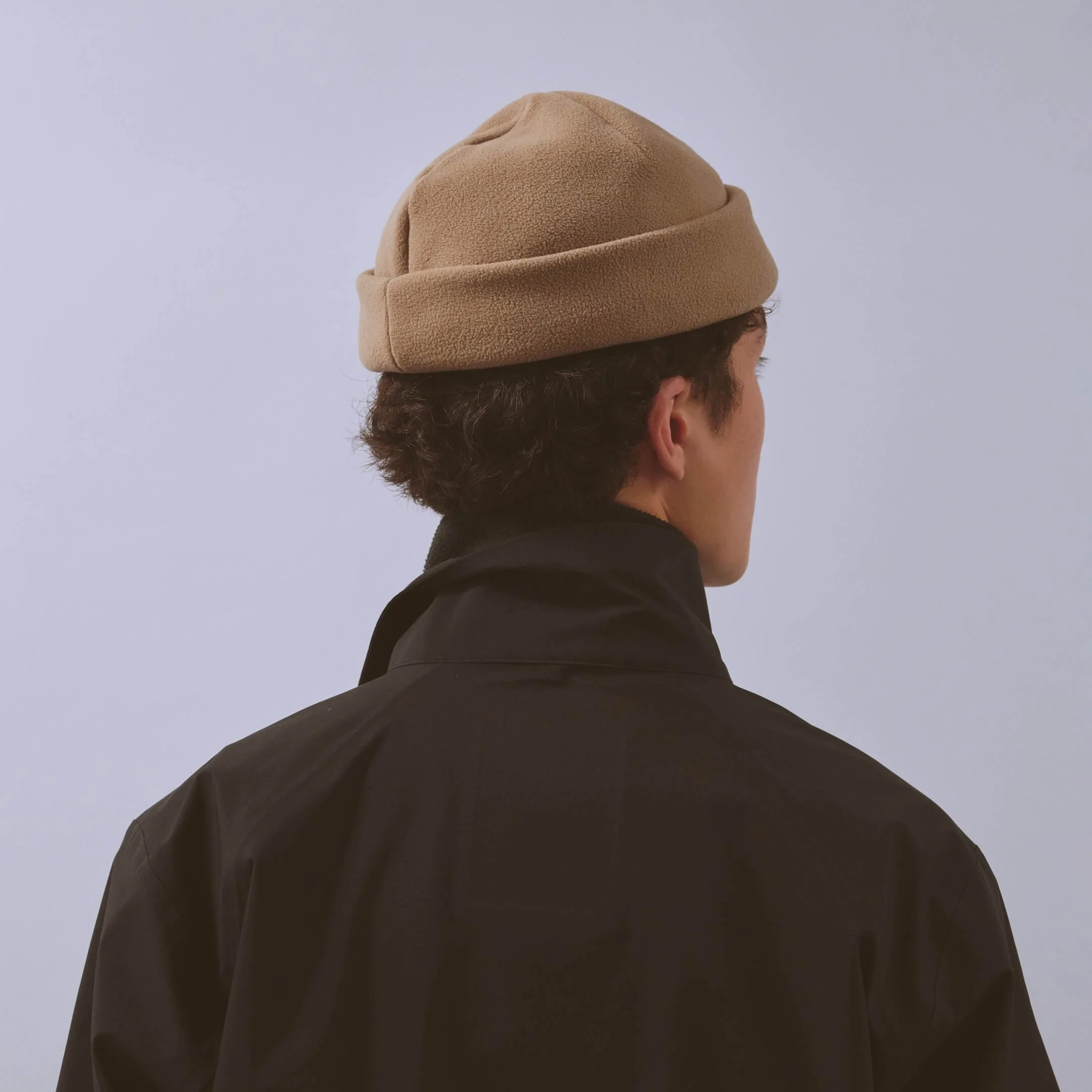 vaga-fleece-beanie-running-hat-taupe-model-back-angle.jpg