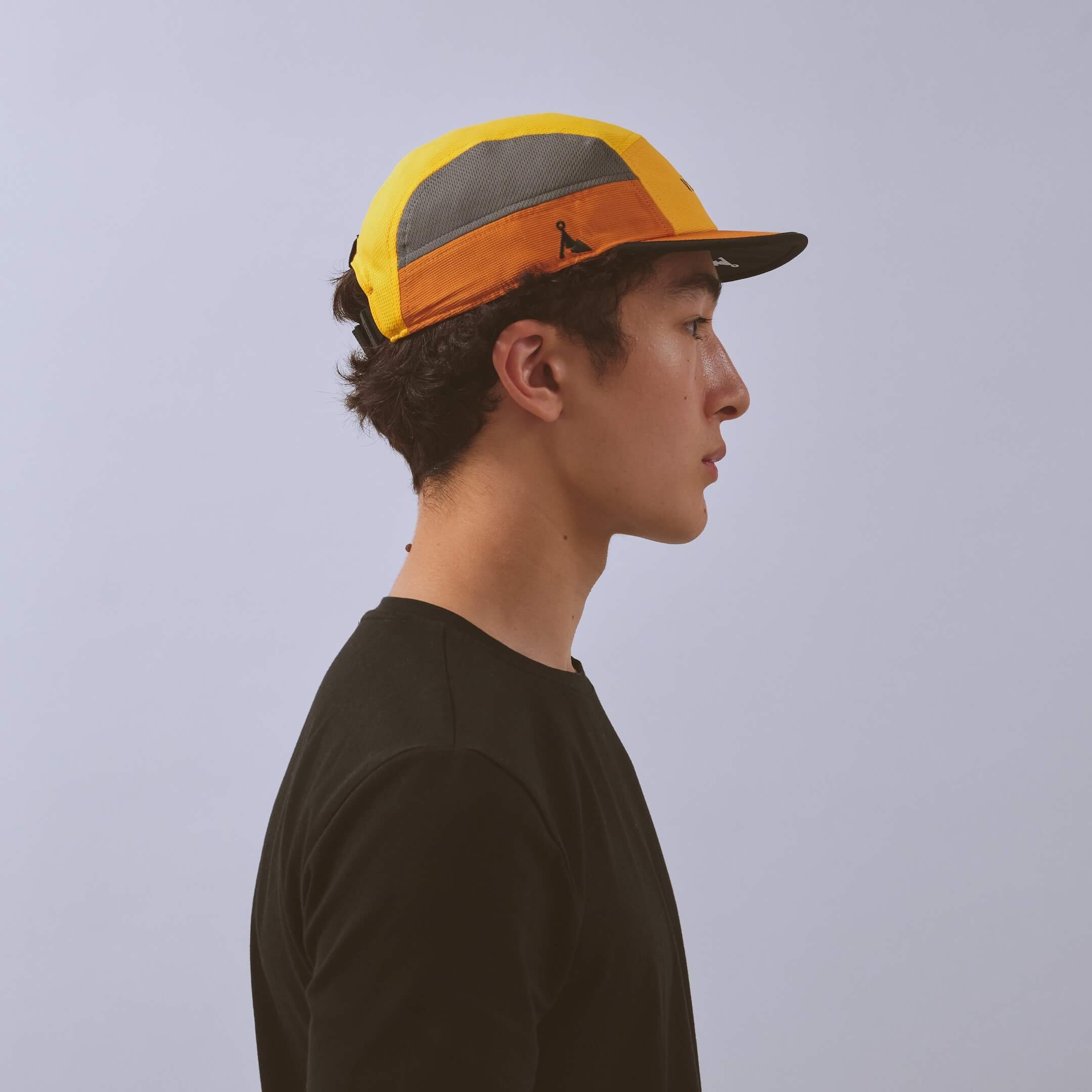 vaga-club-cap-running-cap-yellow-amber-charcoal-model-profile.jpg