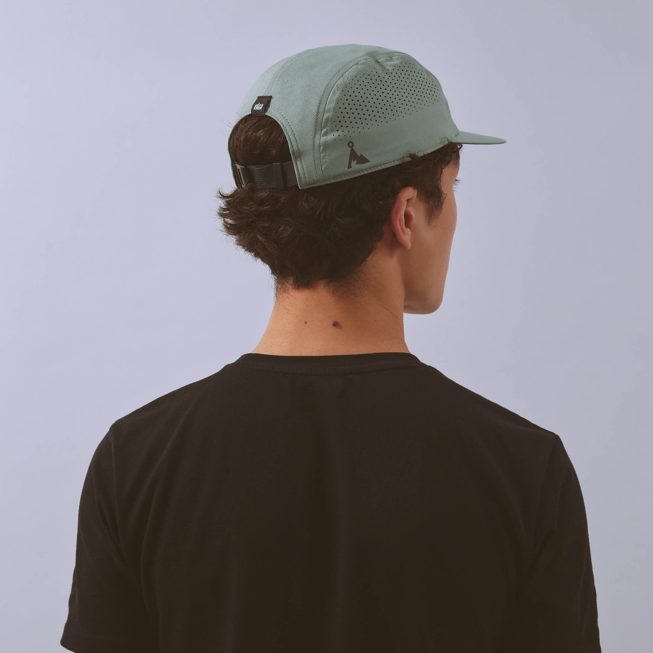 vaga-feather-racing-cap-sagegreen-model-back-angle.jpg