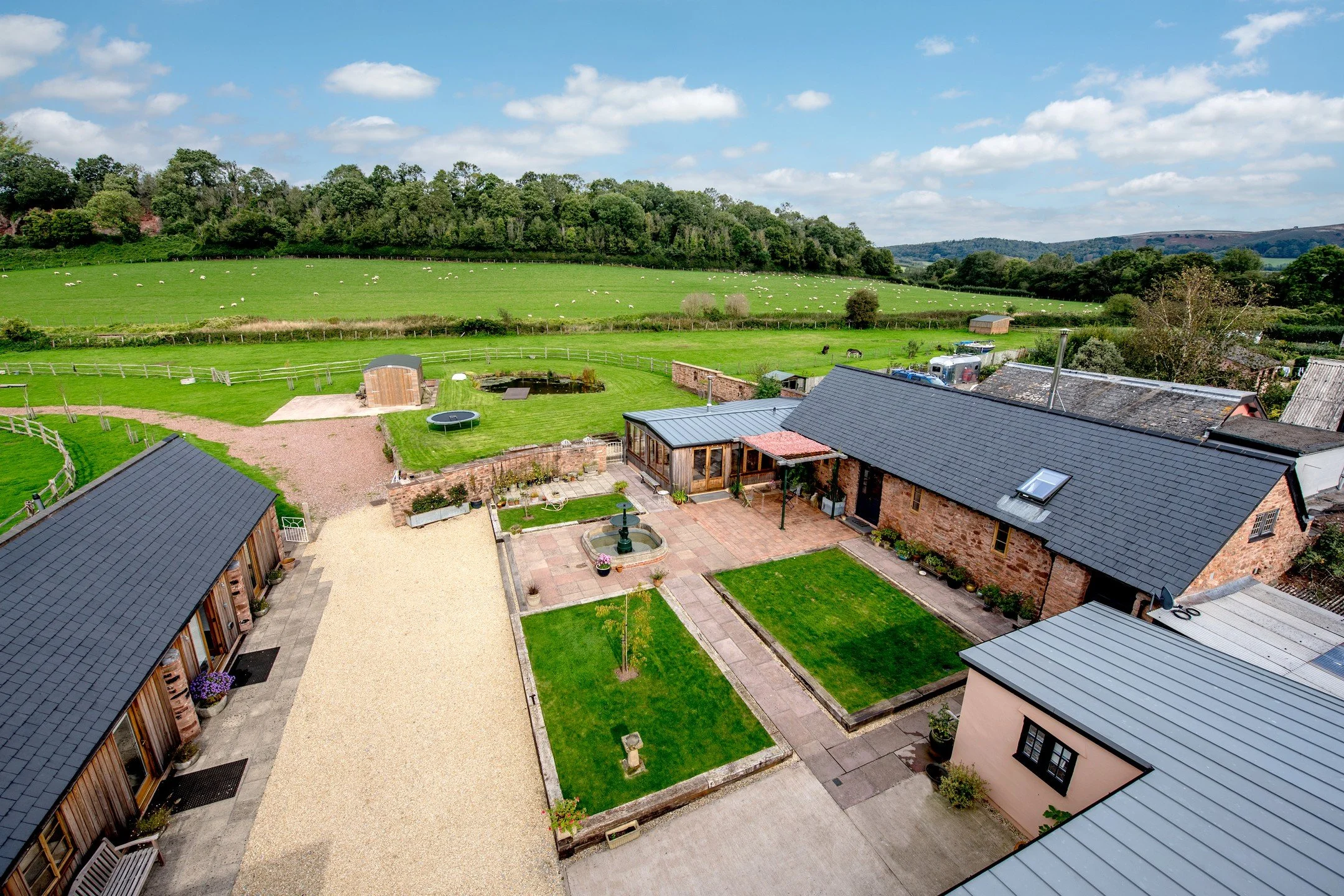 Completed: Formally a small farmstead within a Somerset hamlet, LSL Architecture Ltd worked closely with our clients to convert these buildings into a main residence with ancillary accommodation. 

The buildings sit around an informal courtyard, lead