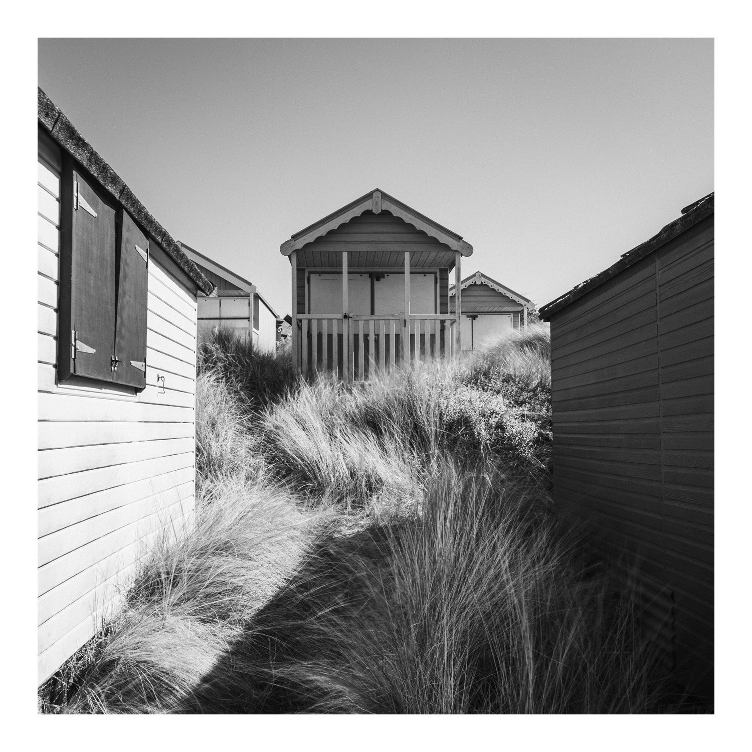 (250401-D005) Between the beach huts, Old Hunstanton, Norfolk. (LtdEd.50)