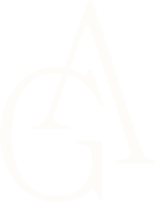 Close-up of a black and white logo with stylized letters G and A.