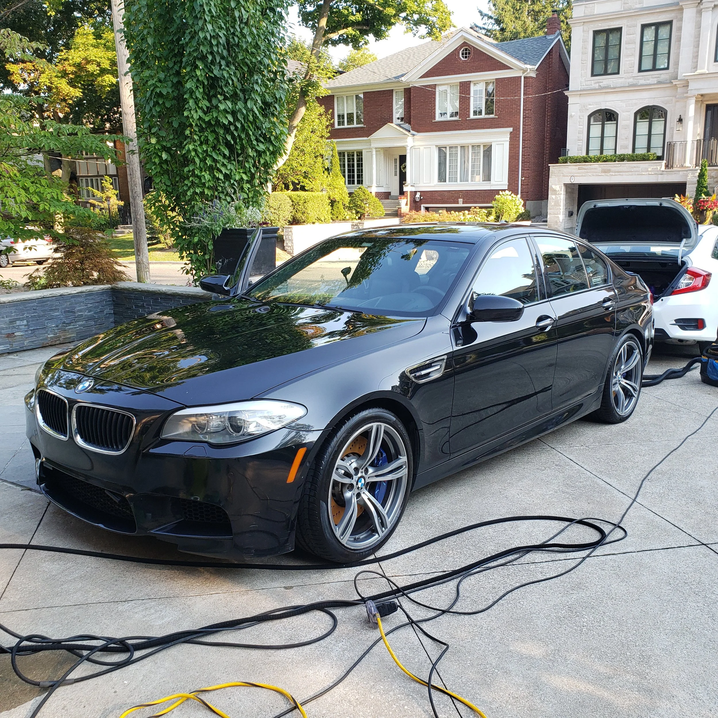 Full exterior detail, powerwash, foamwash and hand wipe along with exterior sealant application to protect and add gloss to paint.