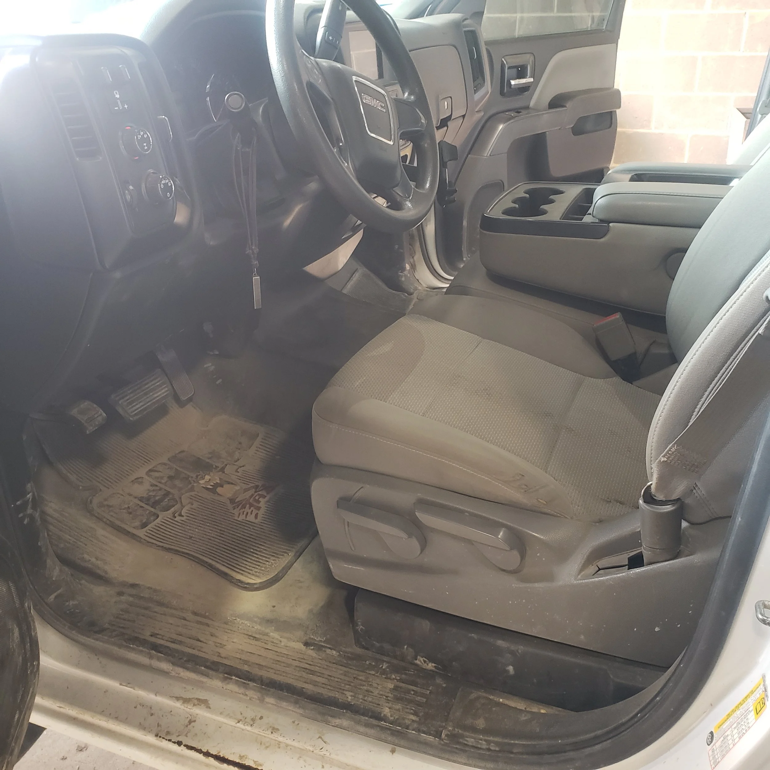 work truck interior to receive a basic detail and restore rubber floors with interior dressing