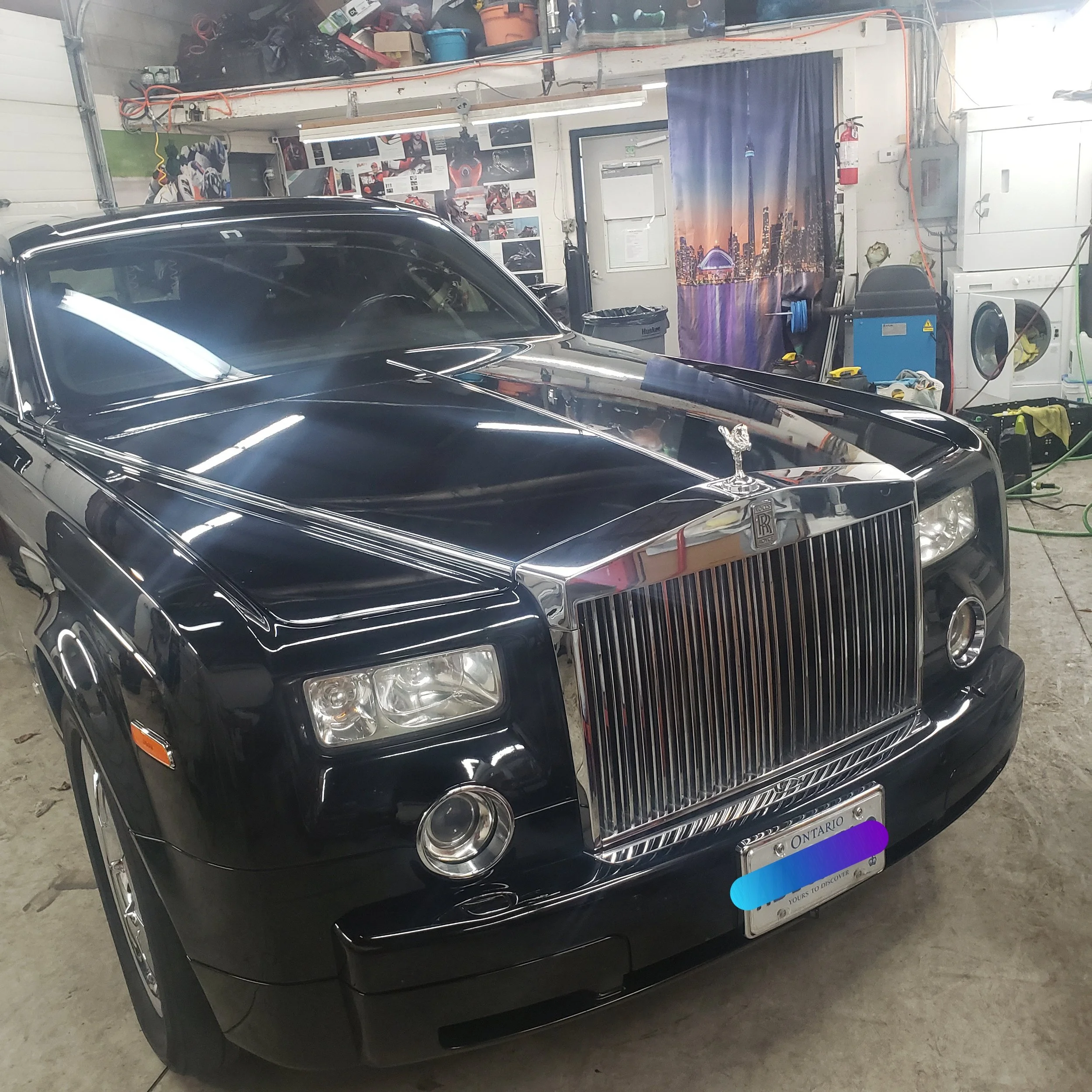 Luxury Rolls Royce being prepared to receive a 2 stage polish service after paint decontamination so it can be ceramic coated with system x