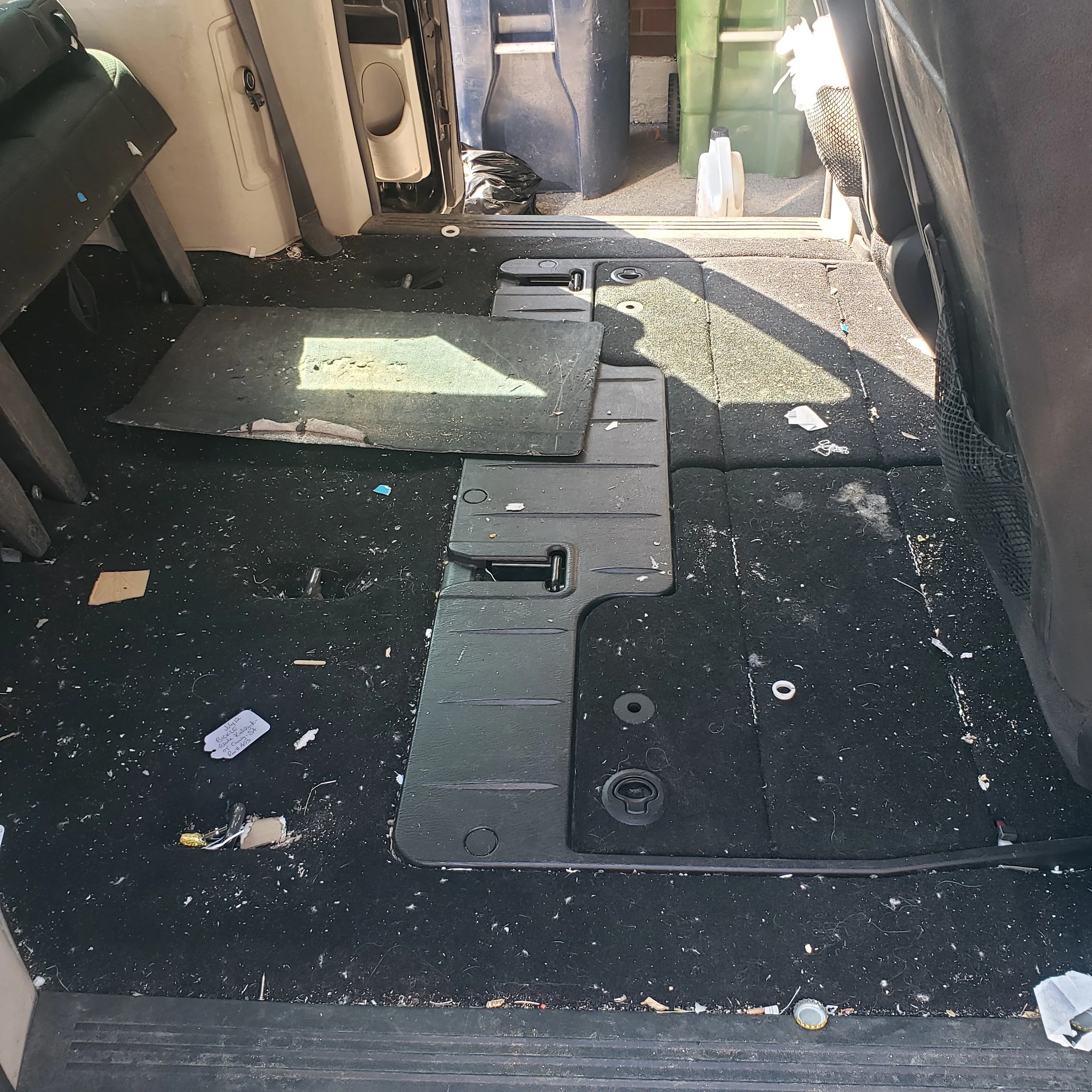 Van requiring dog hair removal, carpet shampoo, steam cleaning to restore condition.