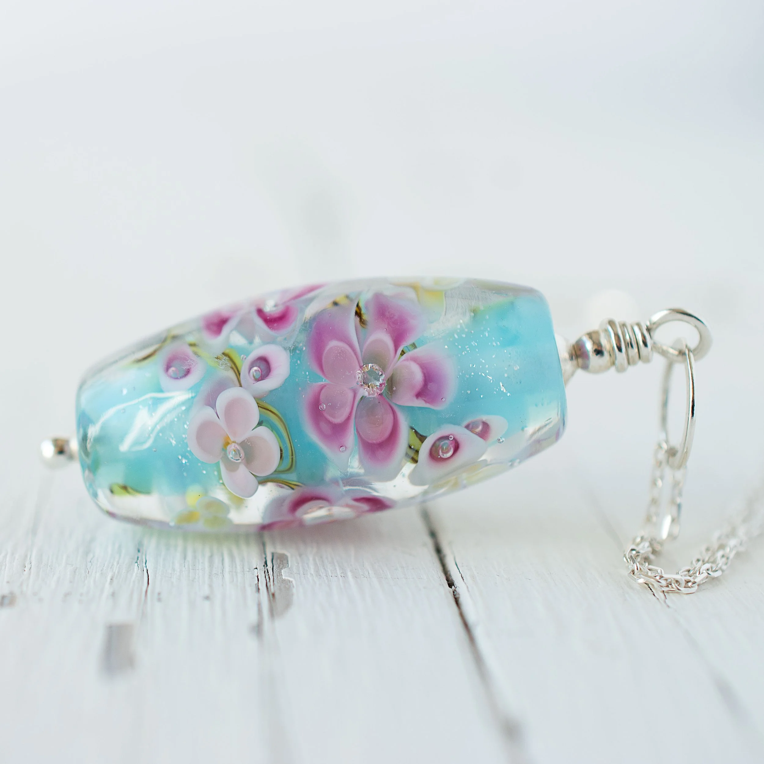 Turquoise Lampwork Floral Necklace with butterfly detail