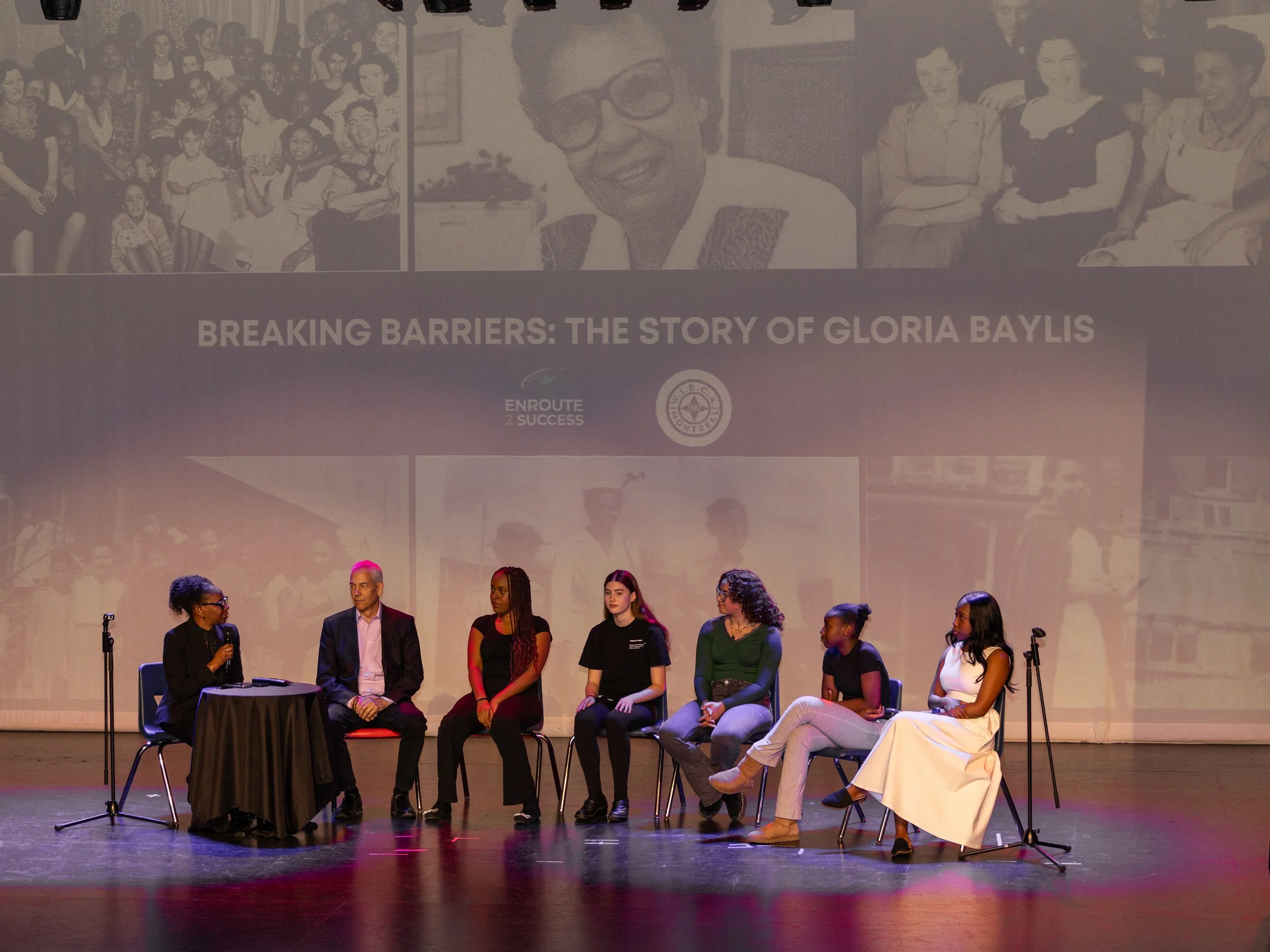 Panel discussion with youth performers and speakers on stage during the Breaking Barriers: The Story of Gloria Baylis event presented by Enroute 2 Success.