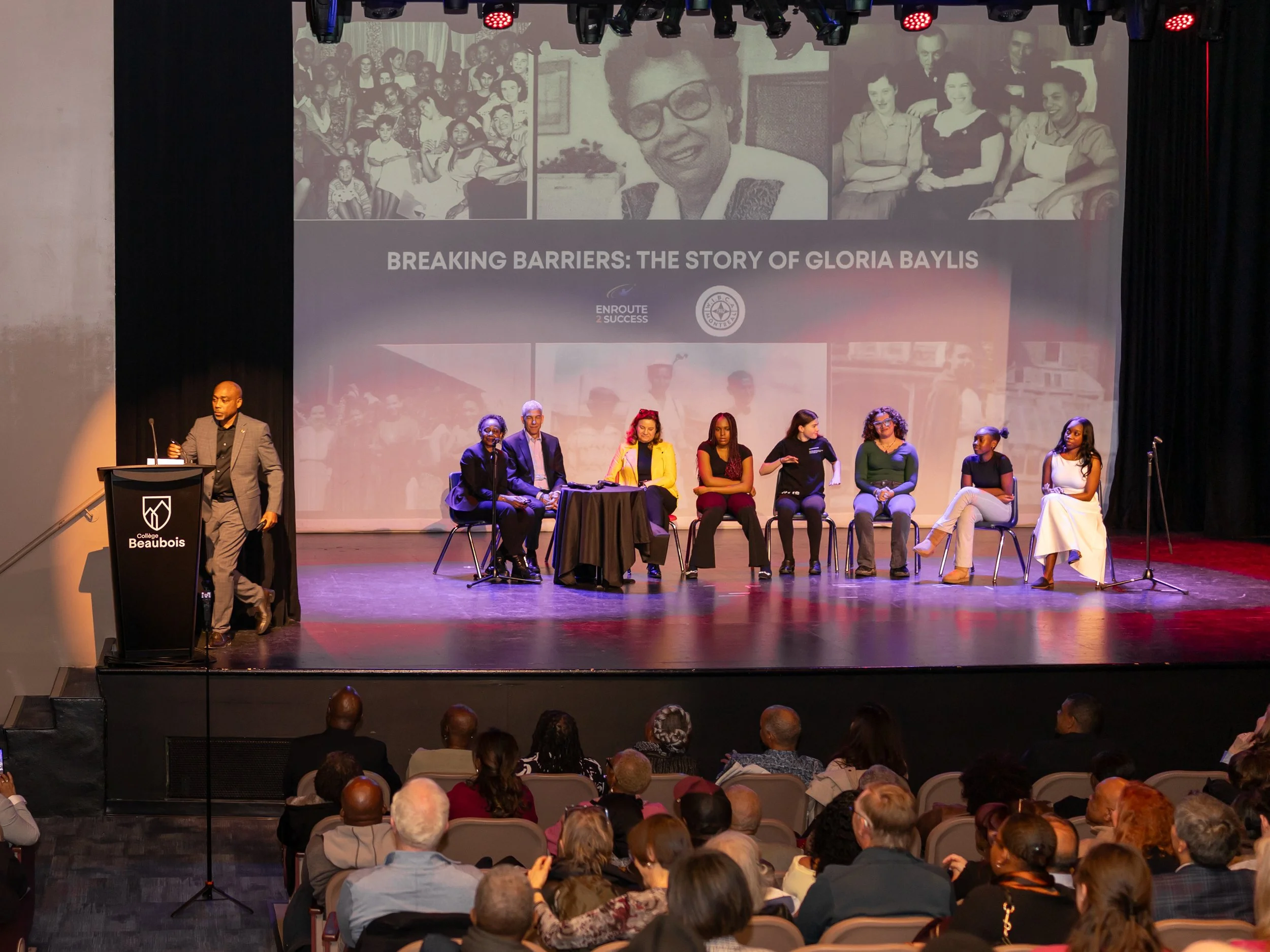 Wide view of stage and audience during Breaking Barriers: The Story of Gloria Baylis live production