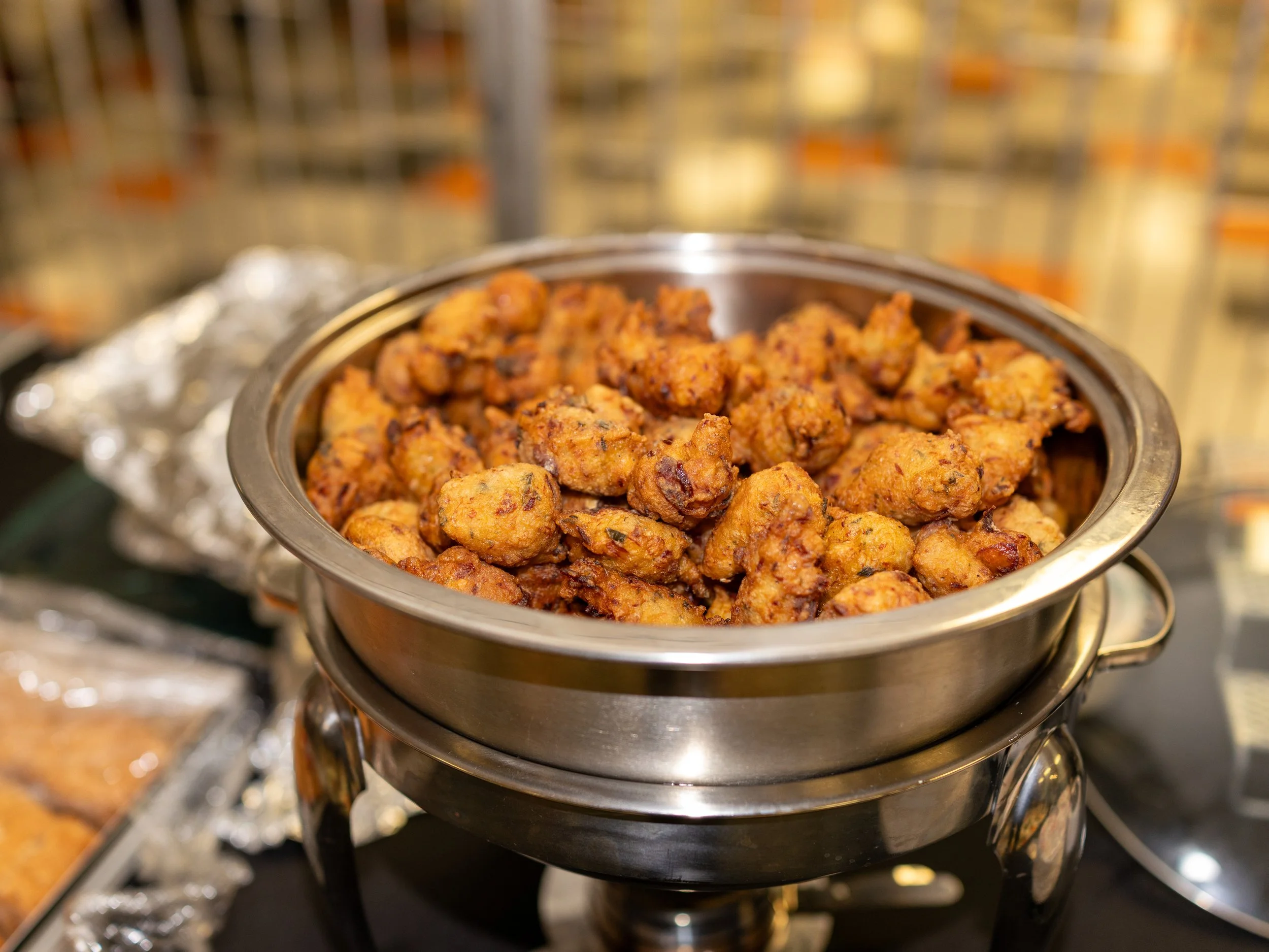 Fish cakes served at reception following Breaking Barriers: The Story of Gloria Baylis event