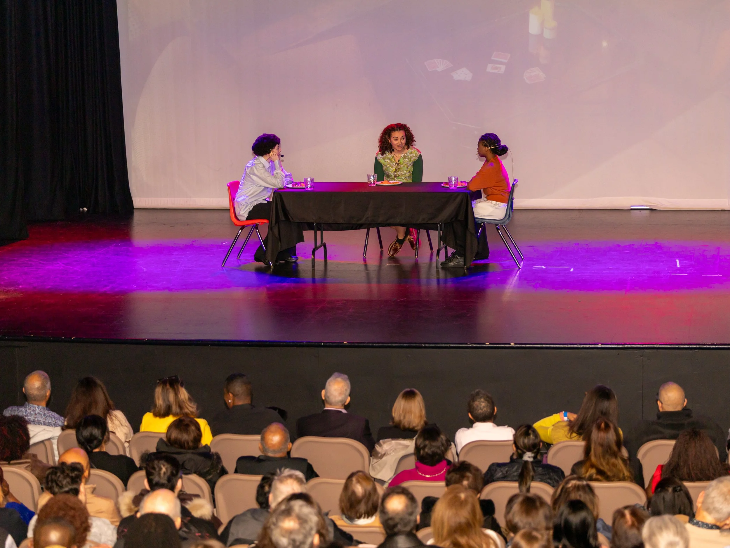 Two youth actors perform a dialogue scene from the Breaking Barriers stage production about Gloria Baylis.