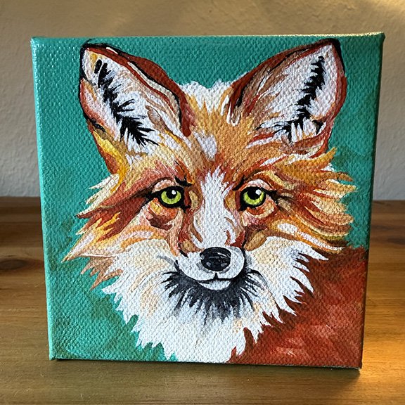 Fox with Glowing Green Eyes