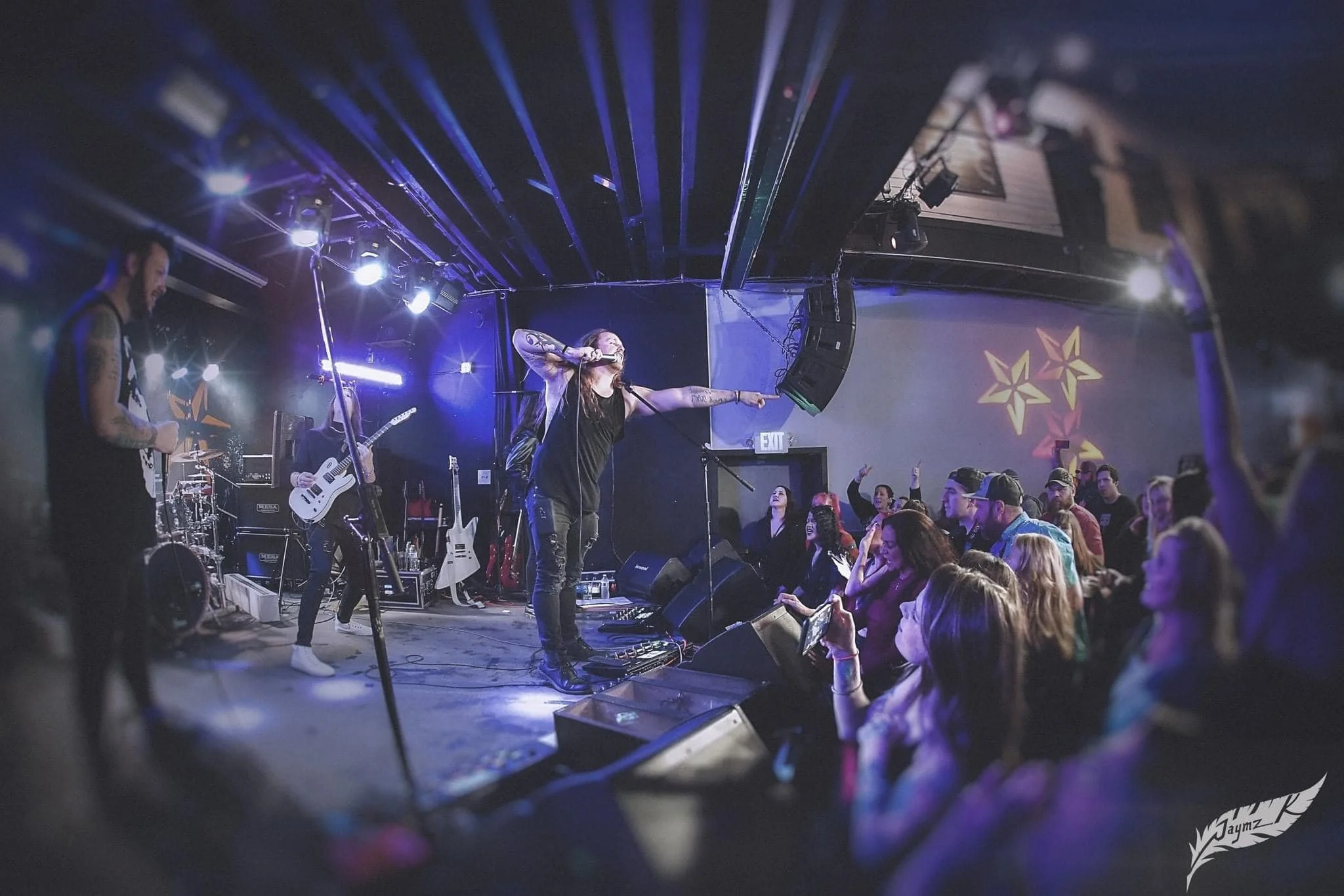 josh at jazzbones pointing at crowd 2024.jpg