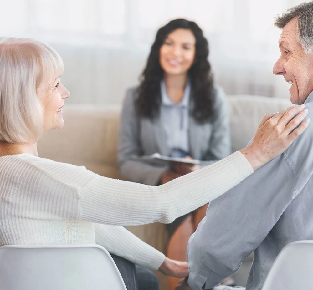 Senior couple receiving guidance from a healthcare consultant, highlighting Mobrise Health's personalized support and care services for seniors.