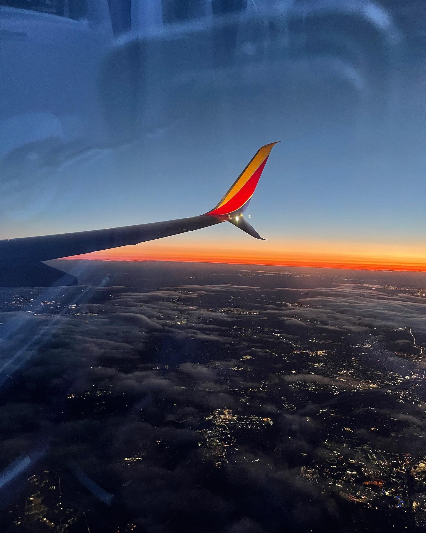The Southwest wingtip 
color-coordinates, at 
dawn, the sky a runway.  #haiku #cloudpoetry