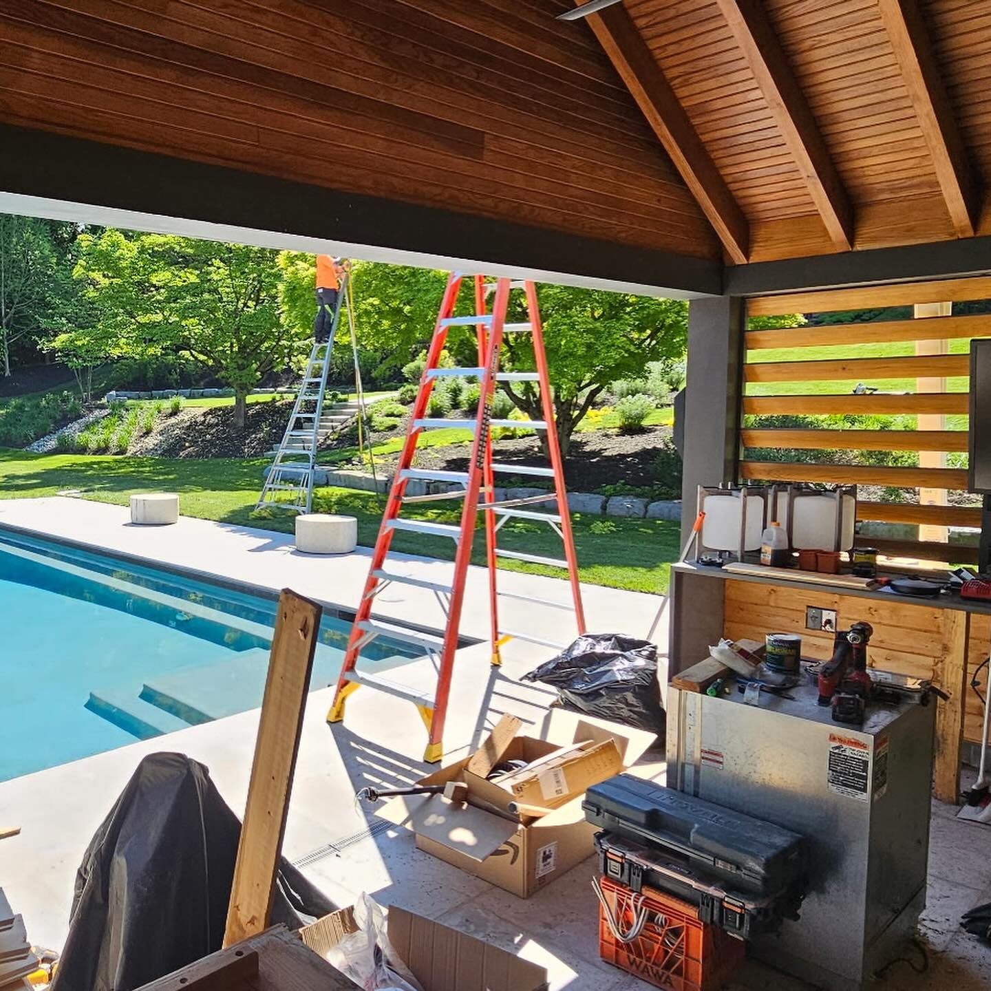 Check out this awesome pool house in Gladwyne that we&rsquo;re working on! The homeowners had a banquette removed, leaving the interior perimeter exposed. We took the opportunity to re-wire the electric and then installed and stained wood tongue &amp