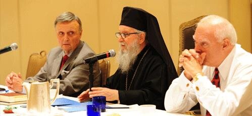 (L to R)Chairman, Constantine G. Caras, Archbishop Demetrios, and Vice Chairman, Charles H. Cotros, preside.