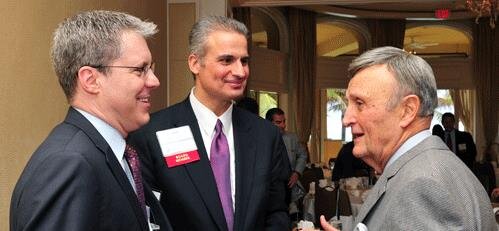 23-(L to R) Board Members Drake Behrakis and John Sitilides with Chairman Constantine G. Caras.