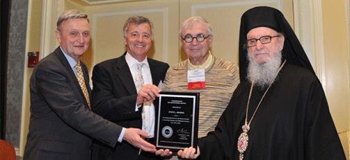 Chairman Constantine G. Caras and Archbishop Demetrios present Commendation for Distinguished Service to Board of Trustees to, left to right, Michael L. Stefanos and John G. Pappajohn