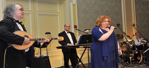 Lina Orfanos performs at Grand Banquet.