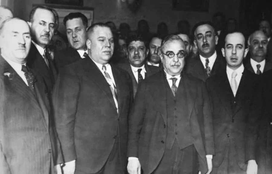   Greek Prime Minister, Ioannis Metaxas (with glasses), rejected the Italian ultimatum.  