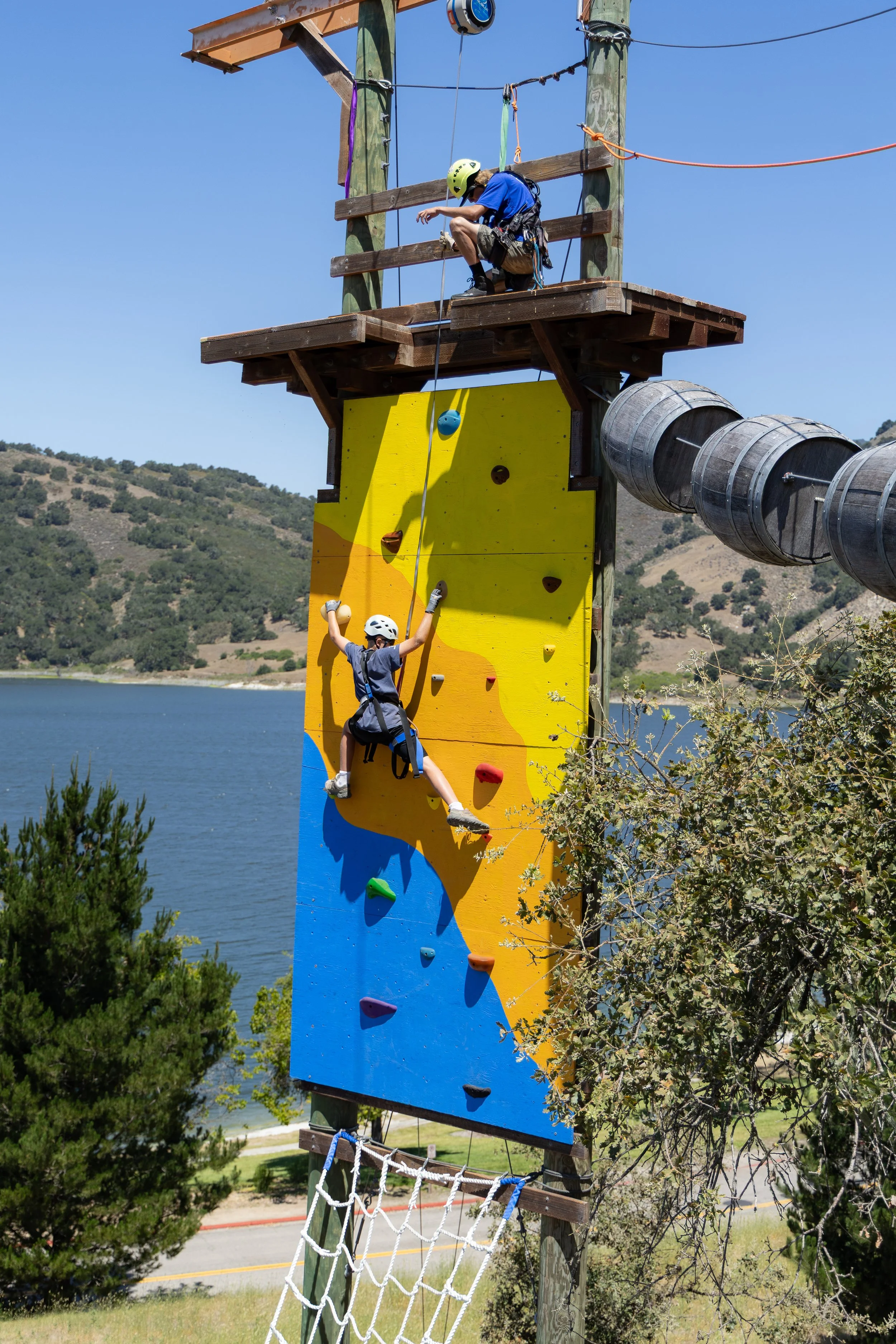 Best Family Activities on the Central Coast. Rock wall, zip lining, and ropes course at Vista Lago Adventure Park near Pismo Beach.