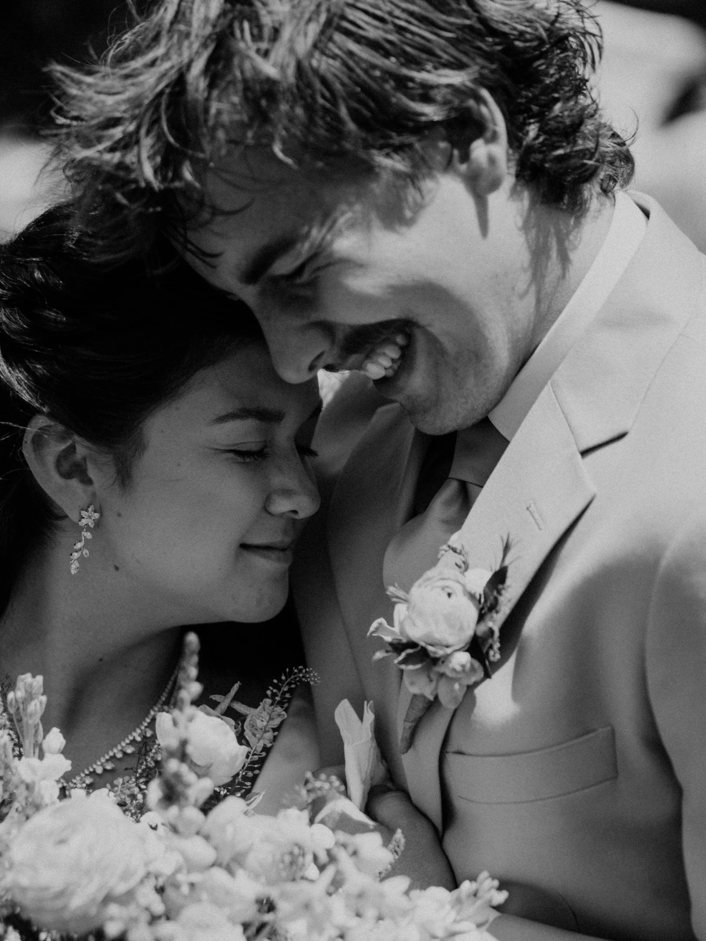 groom cries with bride black and white photo springfield missouri wedding photographer