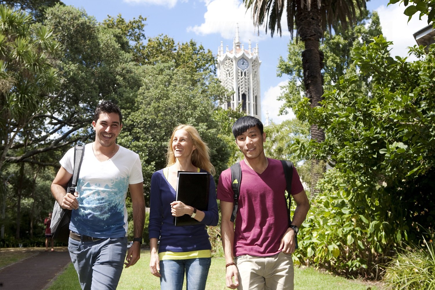 3 Students w Clock Tower.jpg