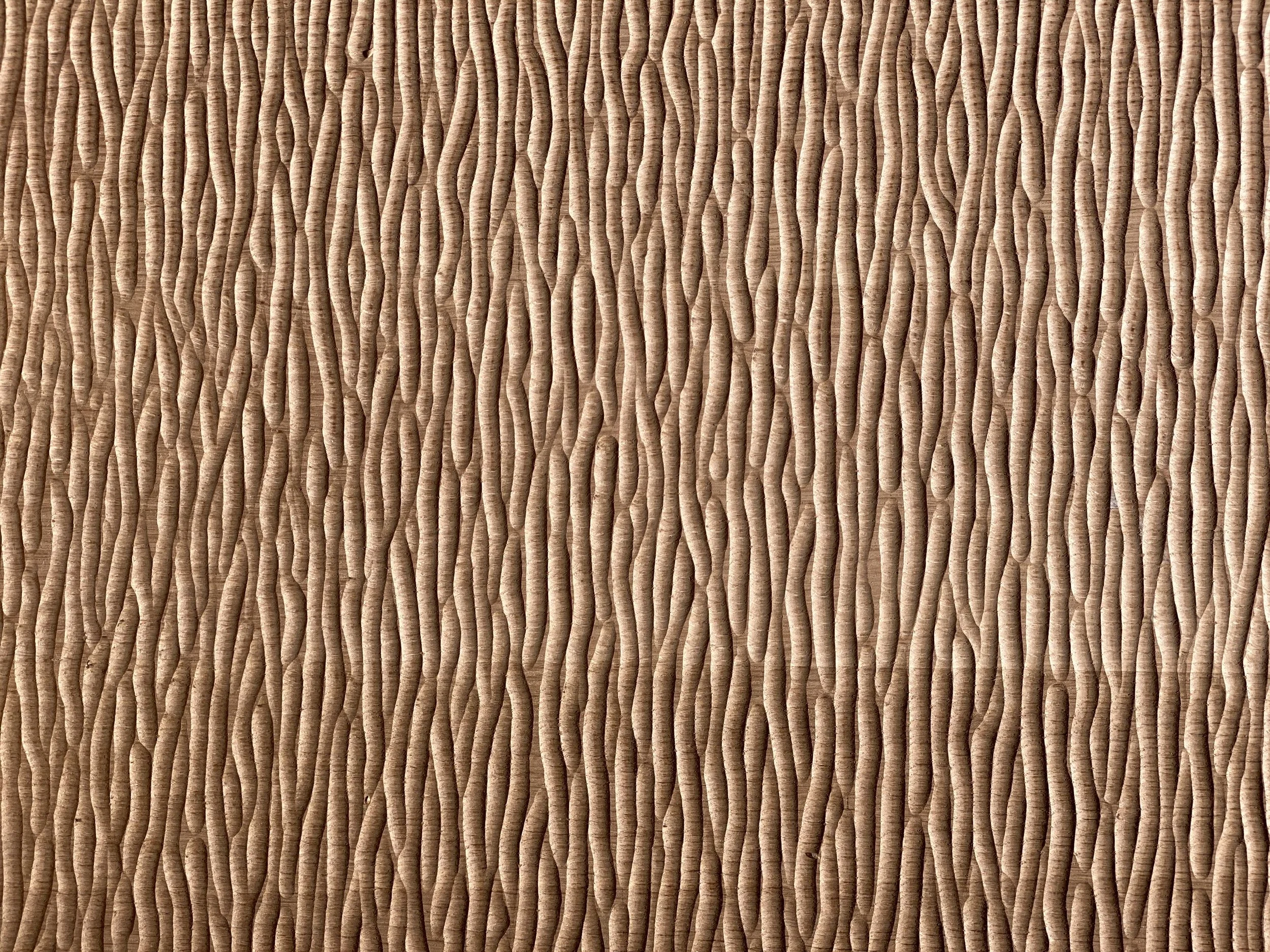 Close-up of a textured bamboo or wooden surface with vertical ridges.
