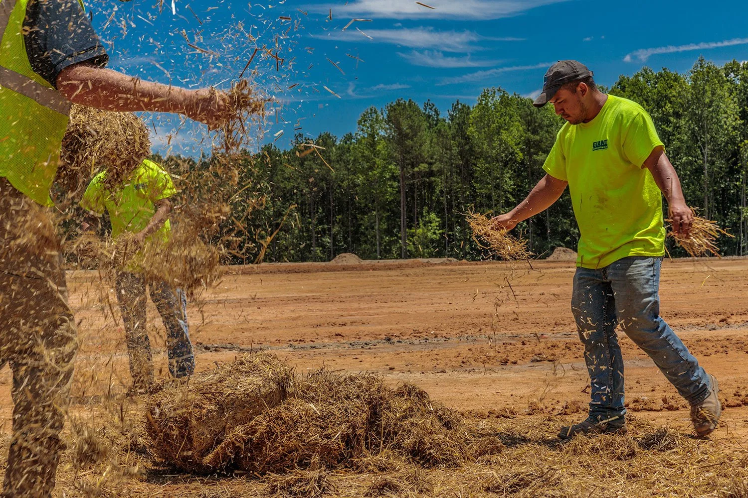 guys-throwing-hay.jpg