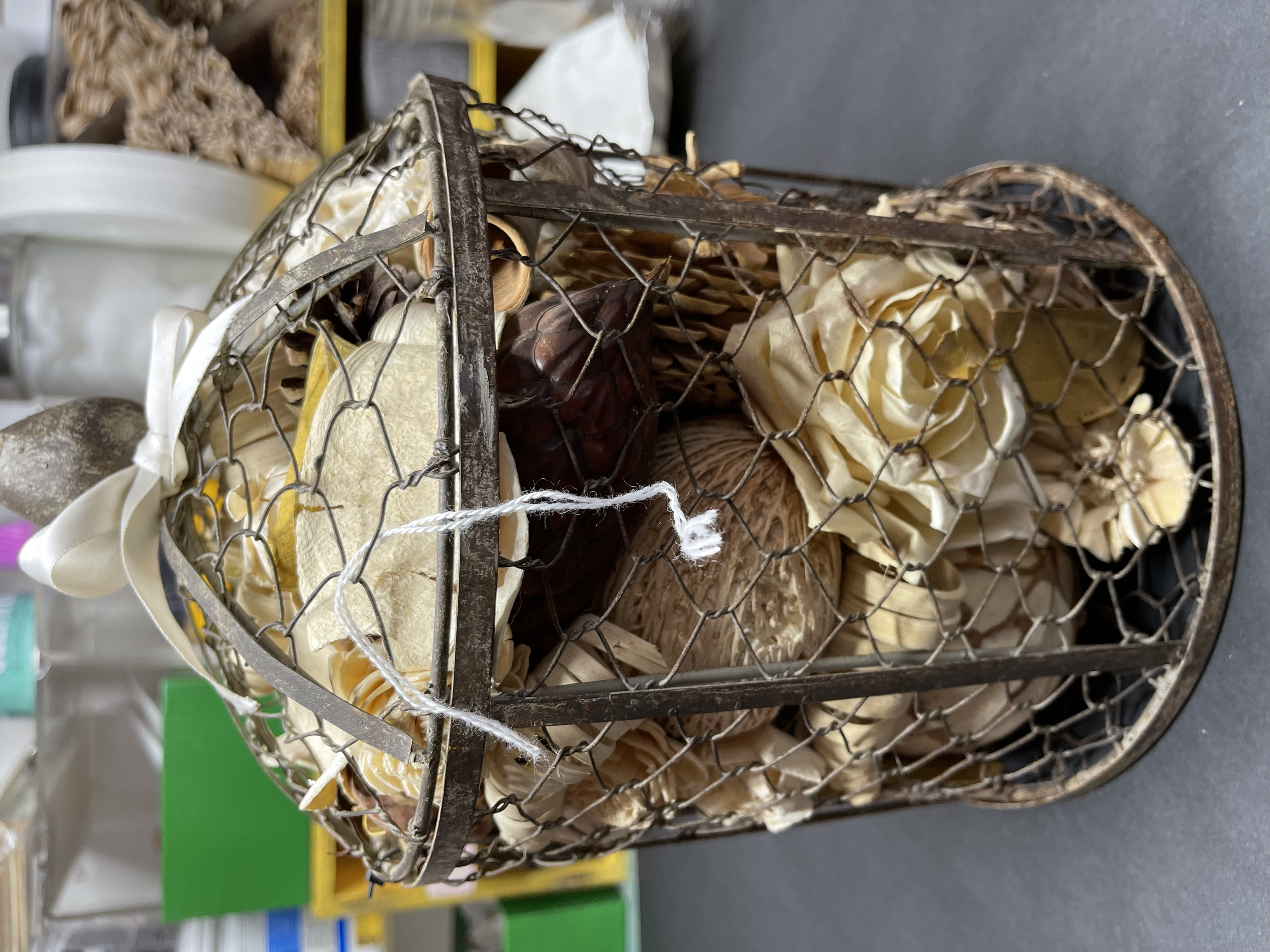 This was a little bird cage that was filled with potpourri type stuff that I purchased thrifting.