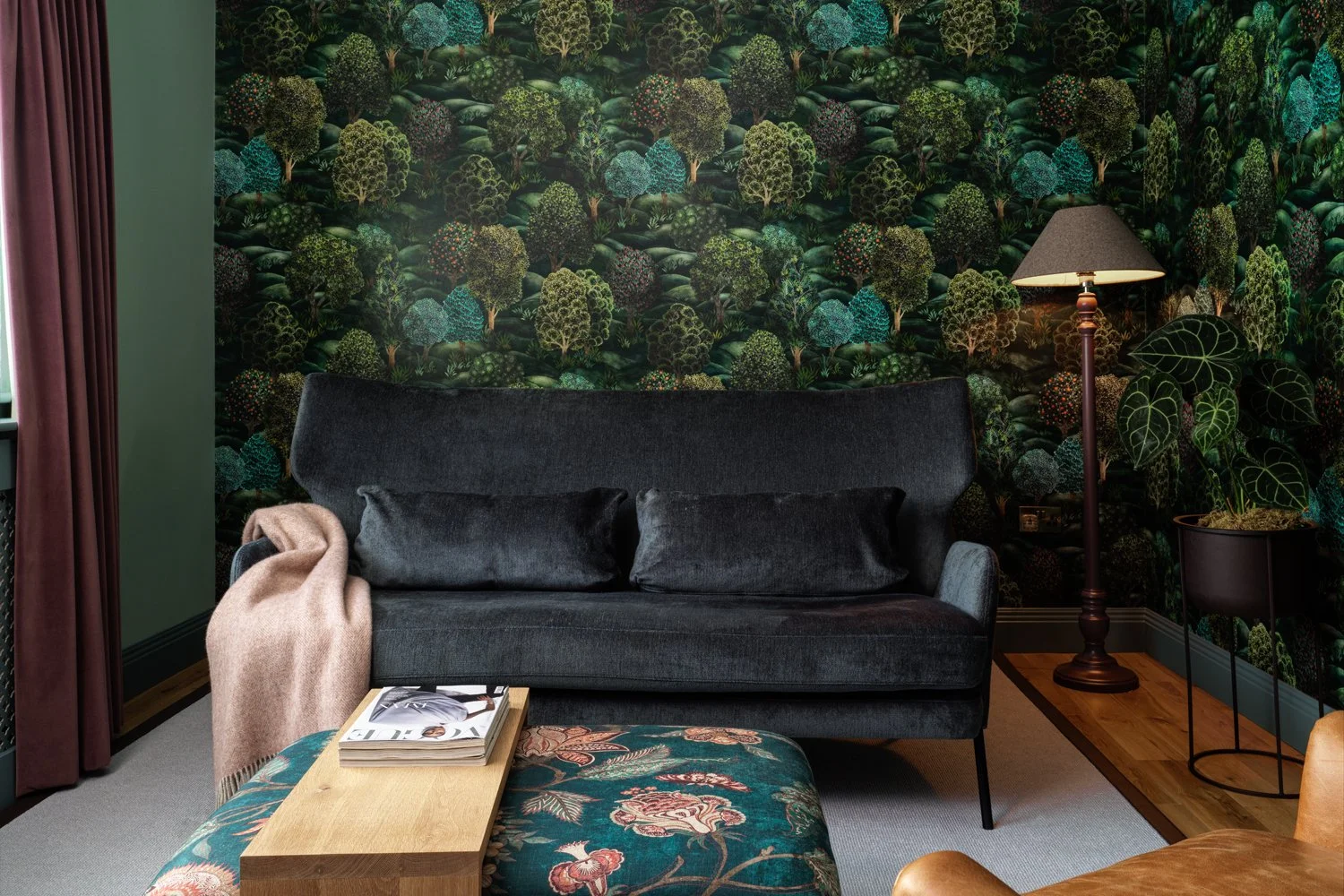 dark green wallpaper with organic pattern in living room interior design