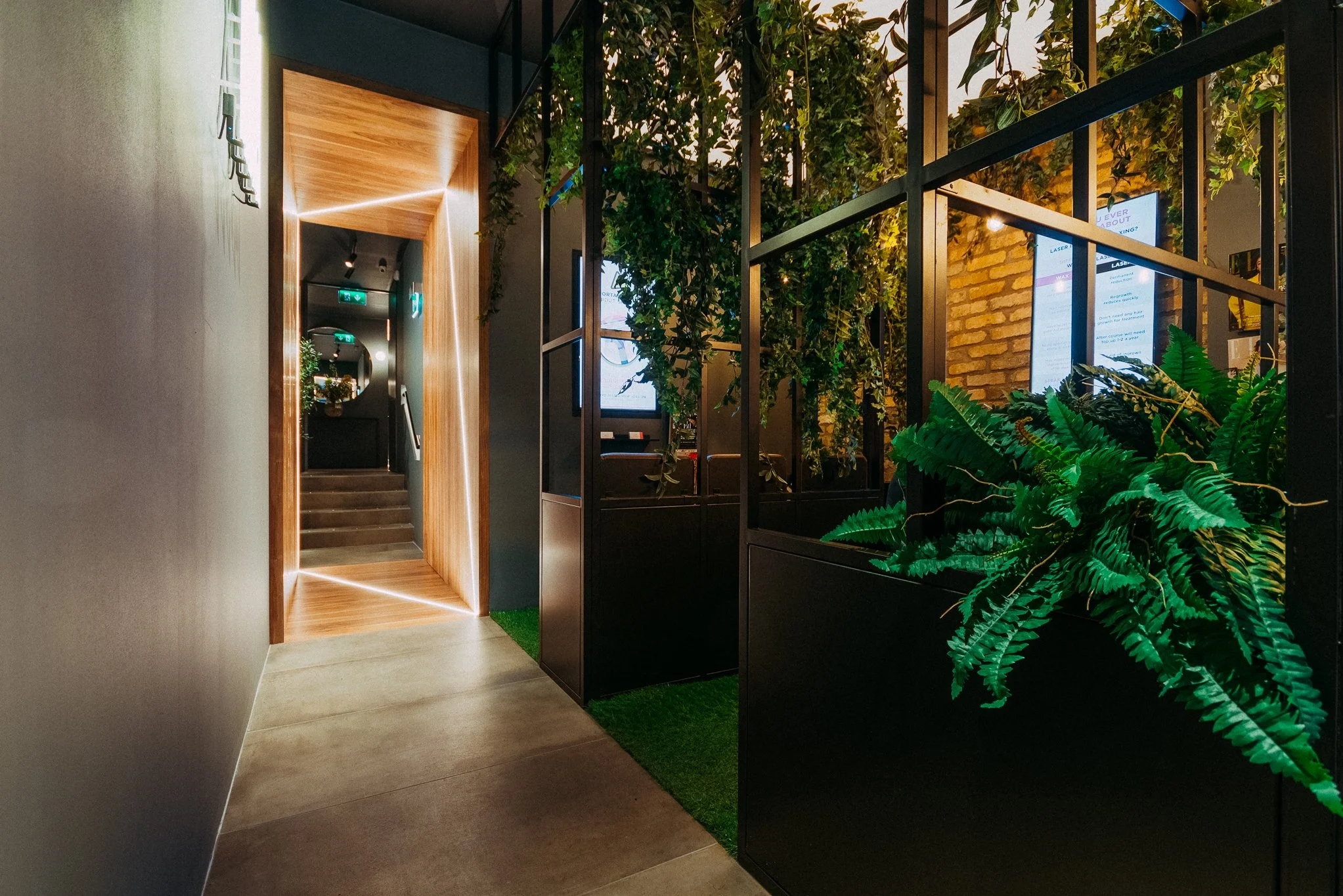 rustic and industrial waiting area with greenery in a beauticians 