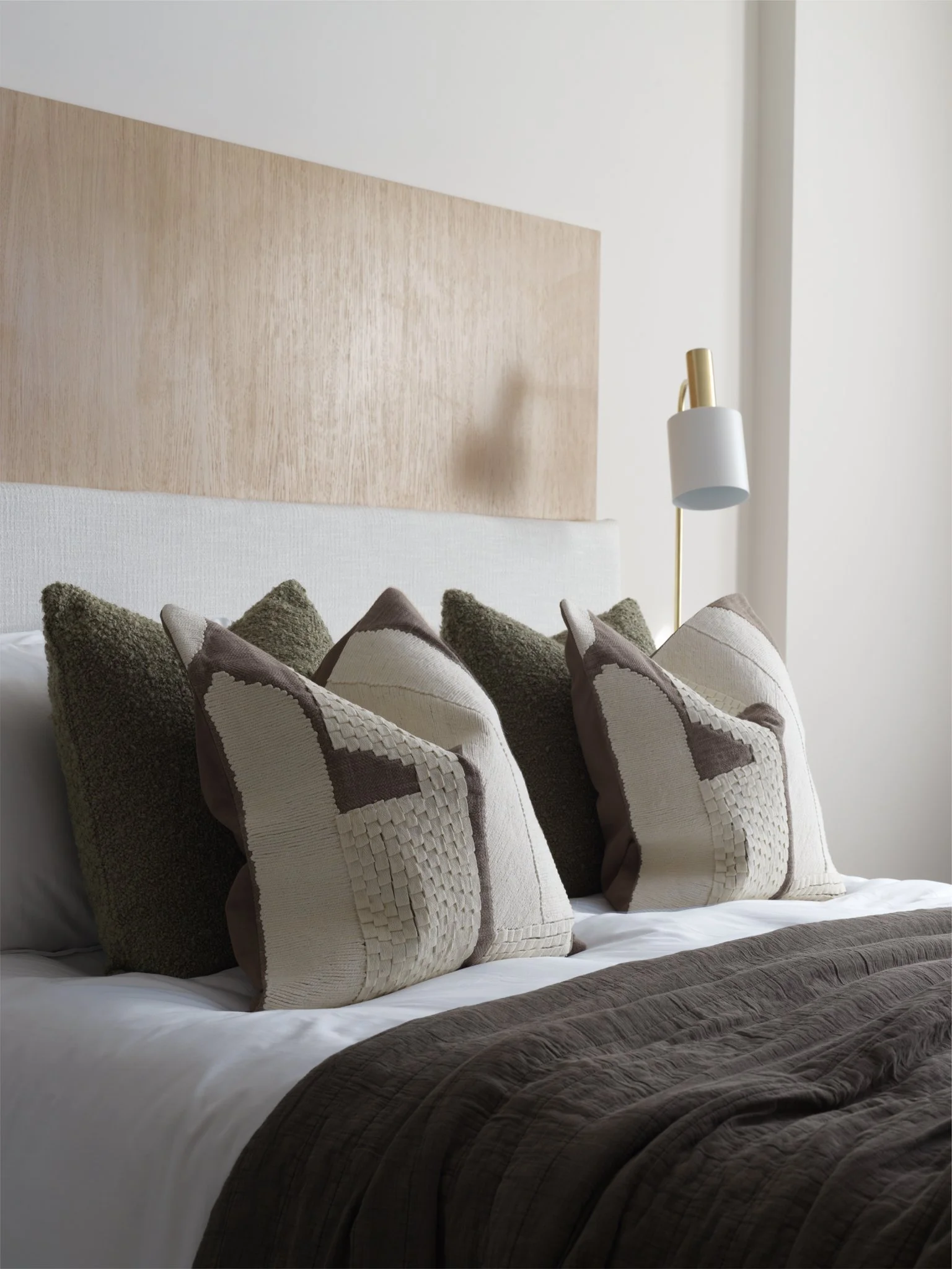 detail shot of pillows on master bed