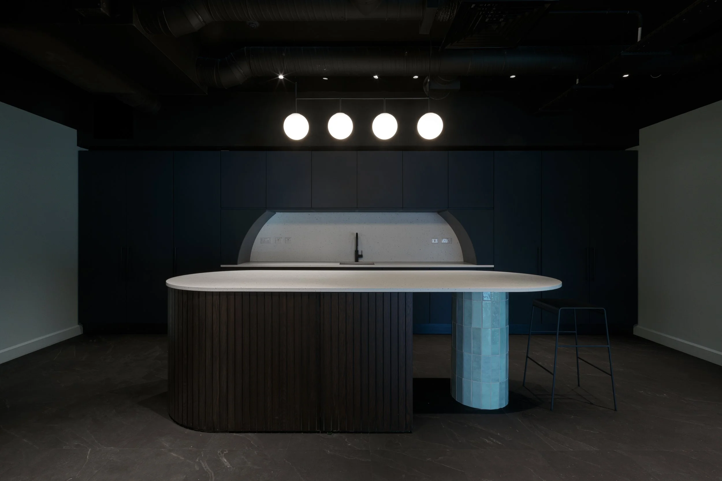 dark modern co-living kitchen island